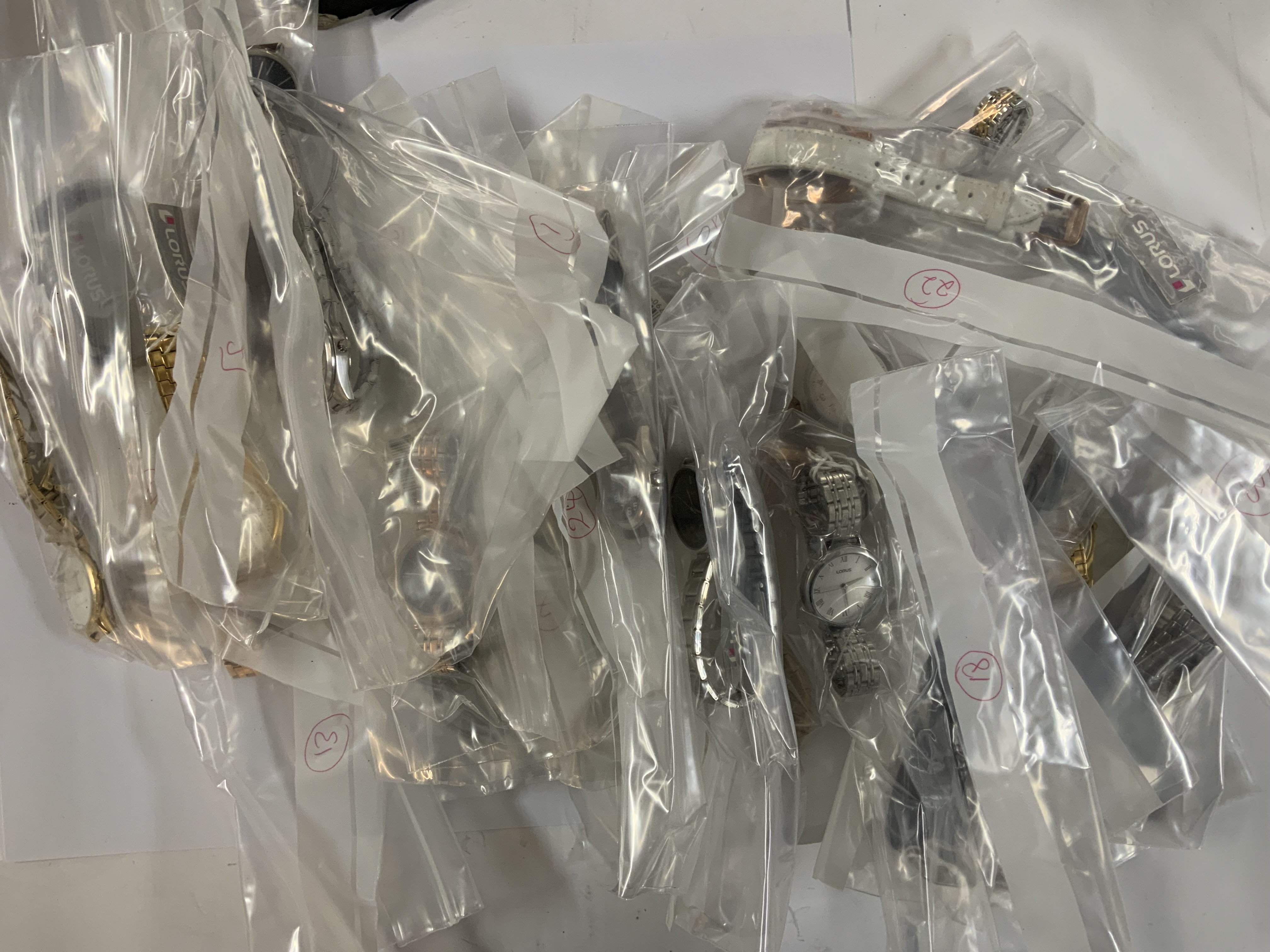 A large collection of Modern New Sekonda and Lorus etc fashion wristwatches.