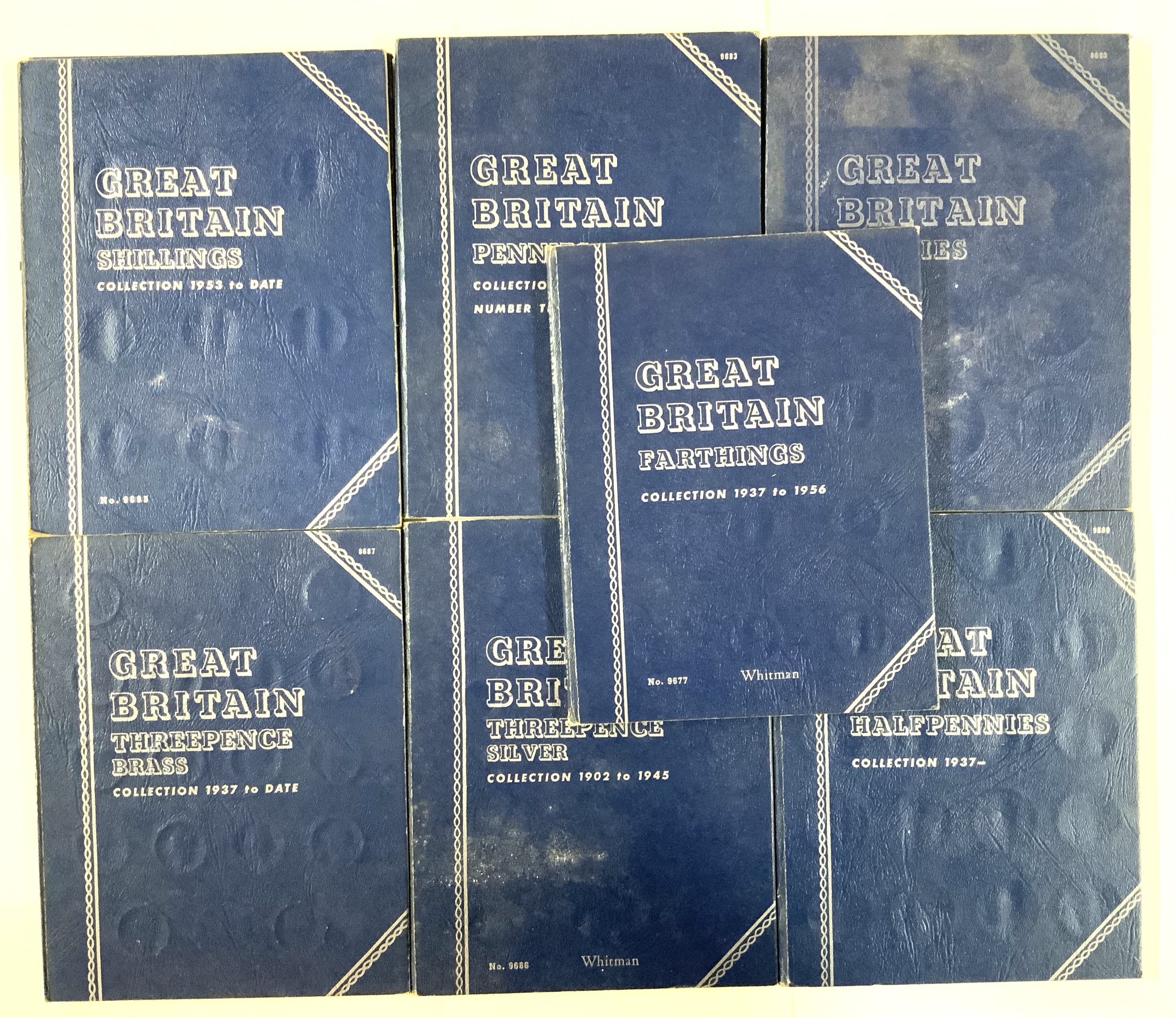 7 Whitman Great Britain coin folders.