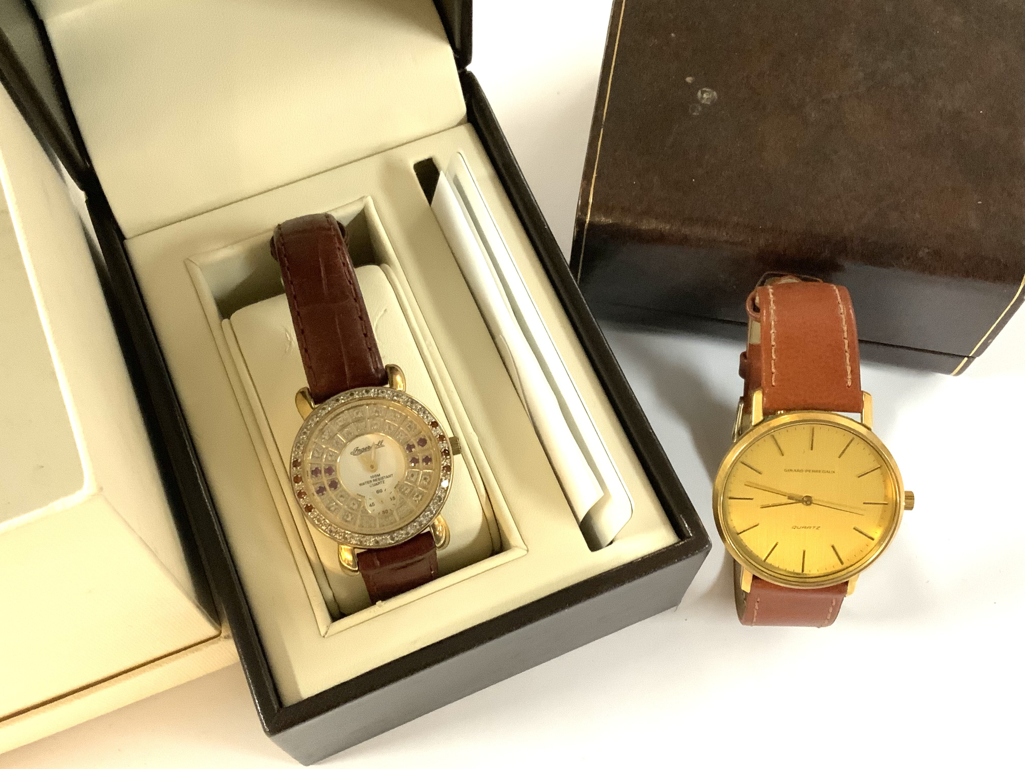 A modern boxed Ingersoll Gems ladies wristwatch together with a gents Gerard-Perregaux quartz wristwatch.