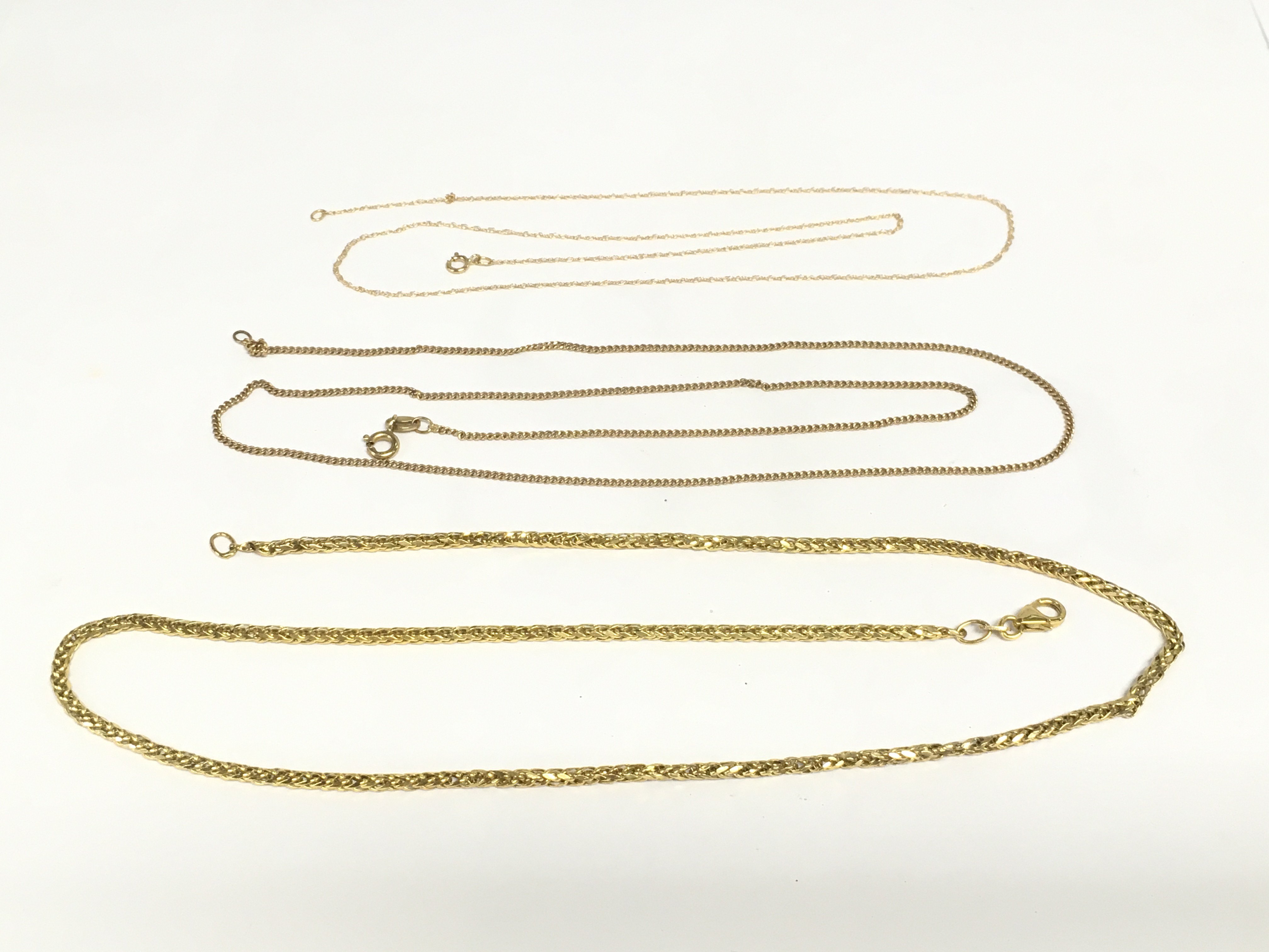 A 9ct link necklace plus two others. Total approx weight 6.6g. Shipping category A.