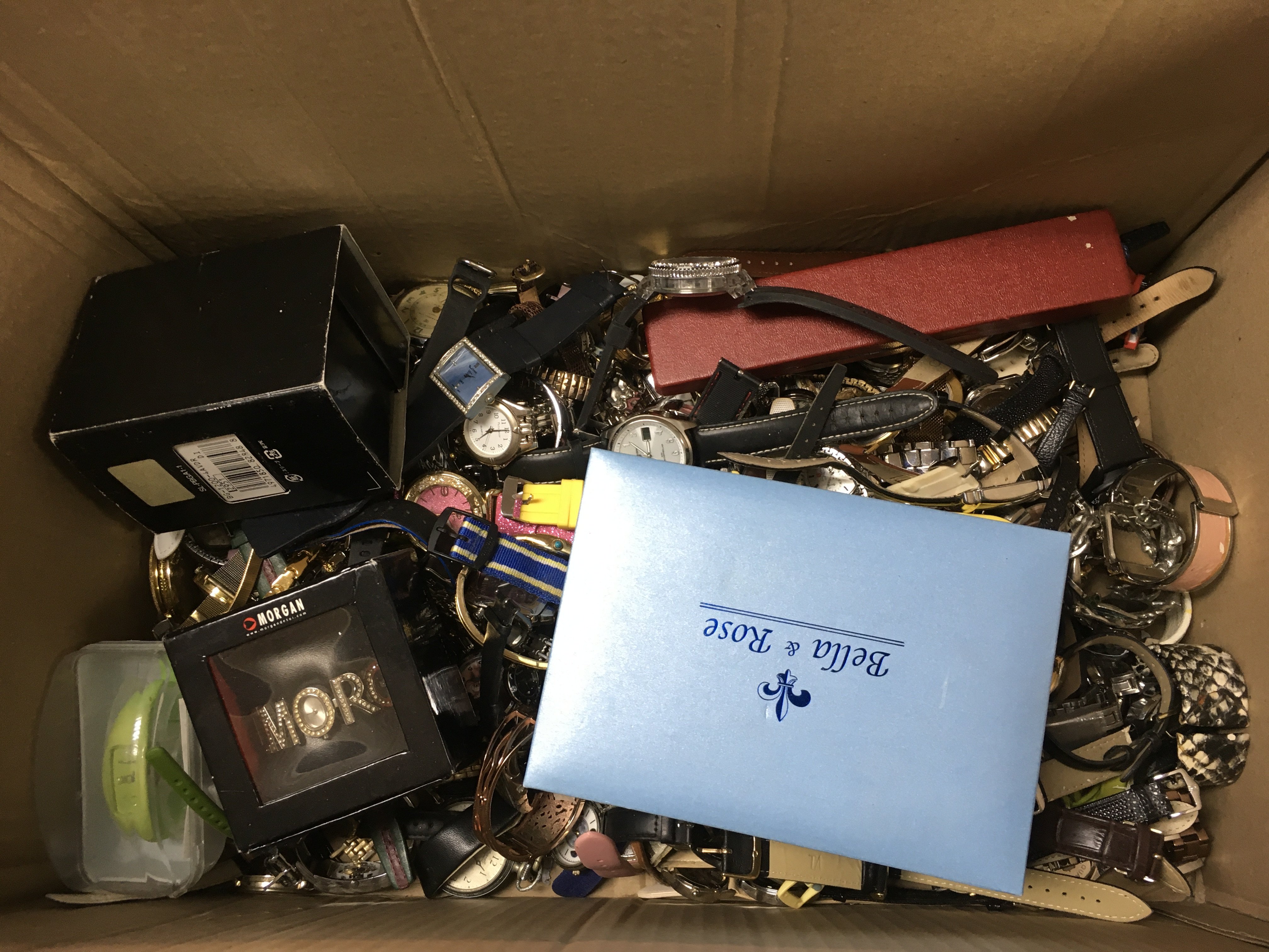 A large box of mixed watches including Ingersoll, Ted Baker, Lorus, Tommy Hilfiger, Reflex etc . This lot cannot be posted