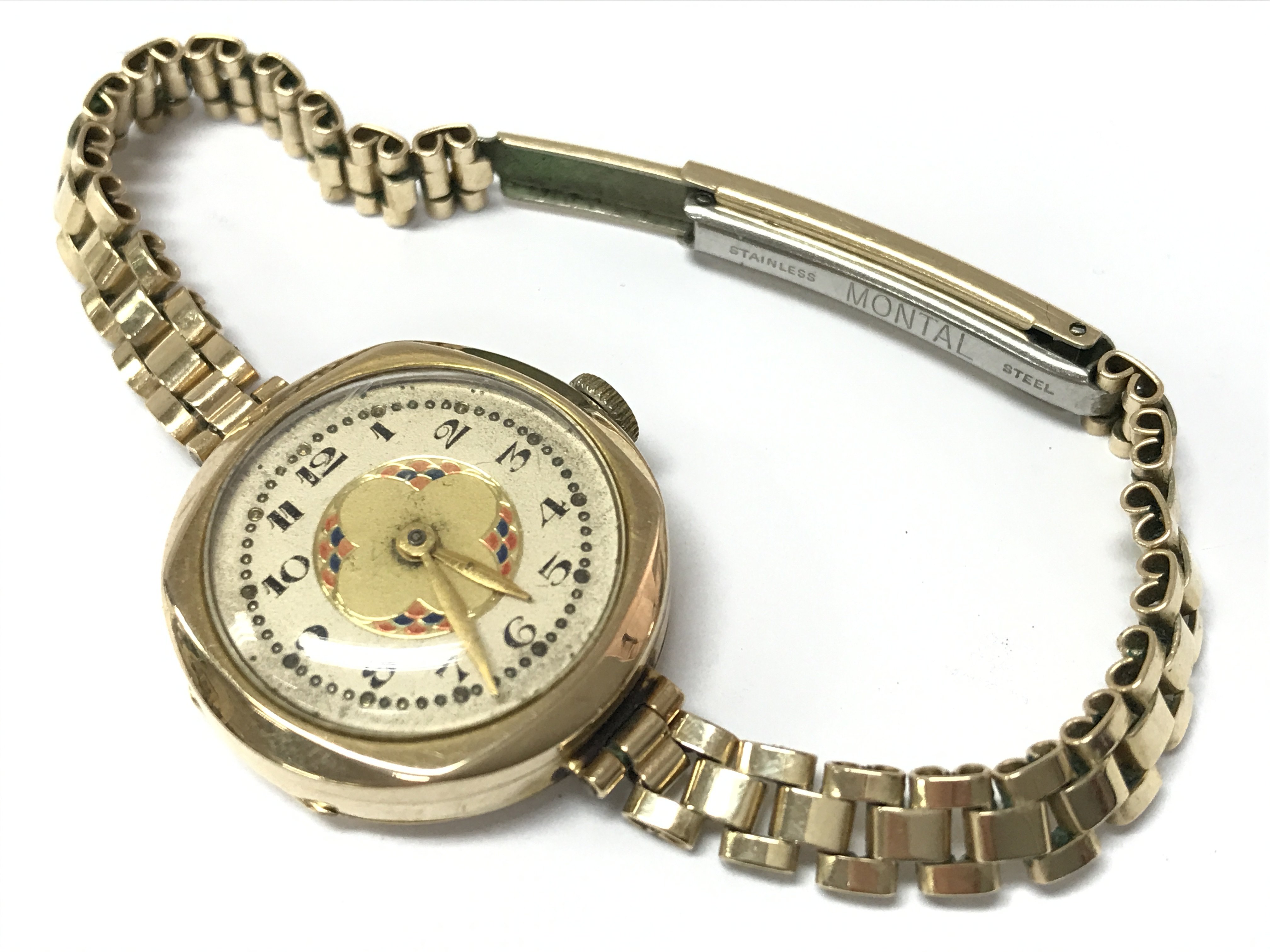 A 9ct gold cased watch and rolled gold strap , 21.2g total weight. Postage category A