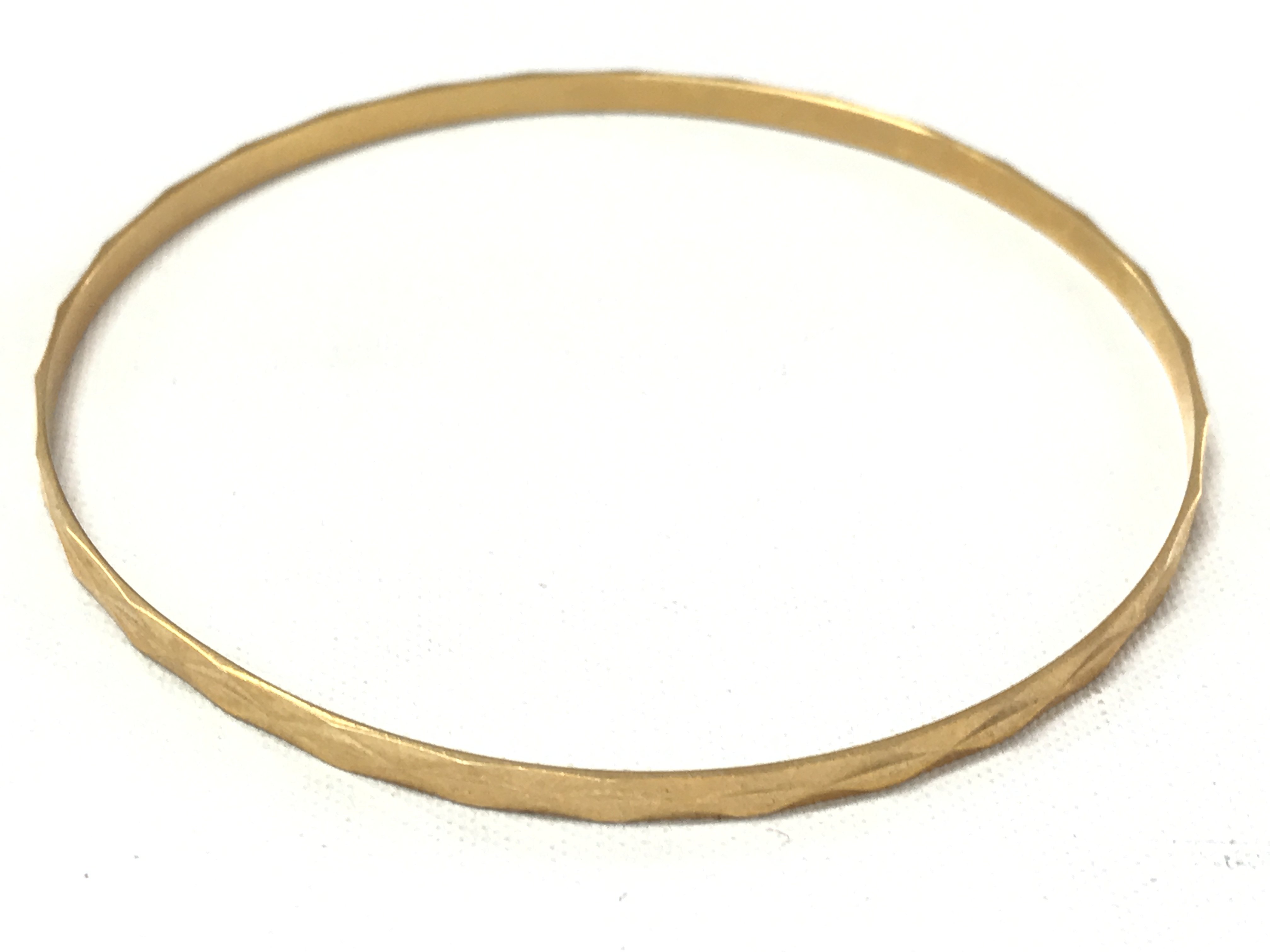 An 18ct gold bracelet , postage category A