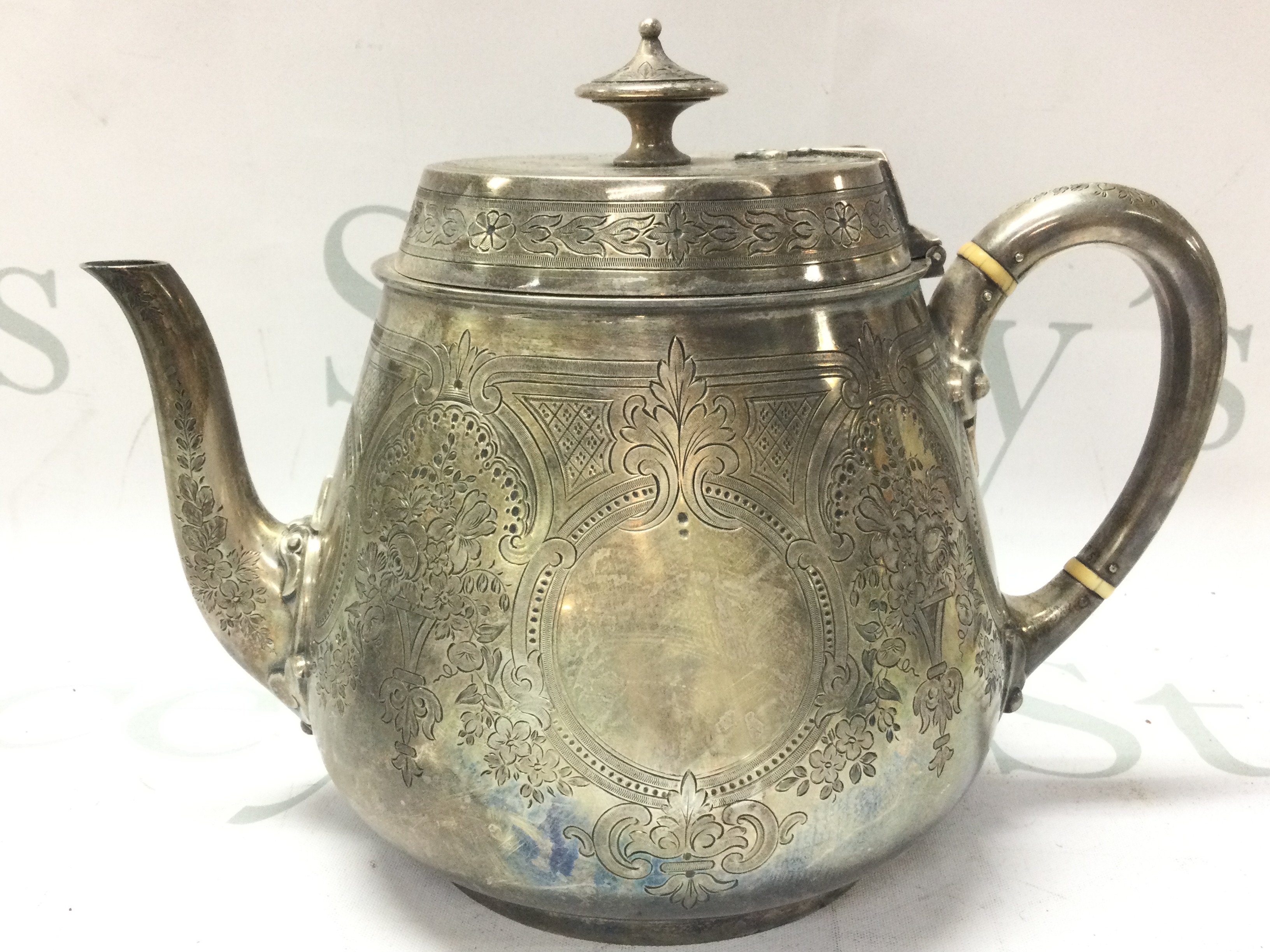 An Ornate Late 19th century teapot , marked London 1880. Postage category B