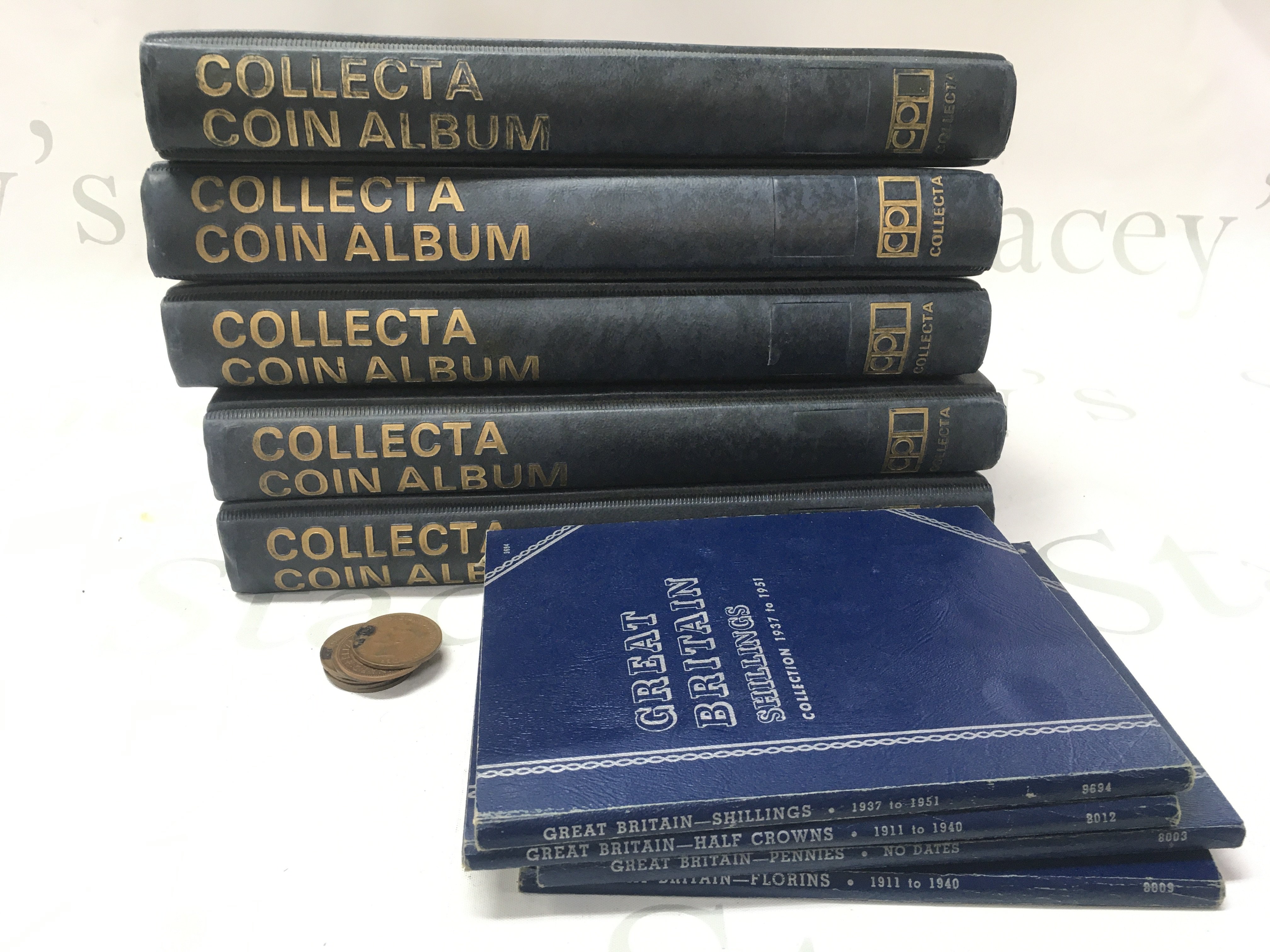Five coin albums and smaller albums (three empty). Albums include Three Pence, one shillings, half crowns, five shillings Etc. Postage category C