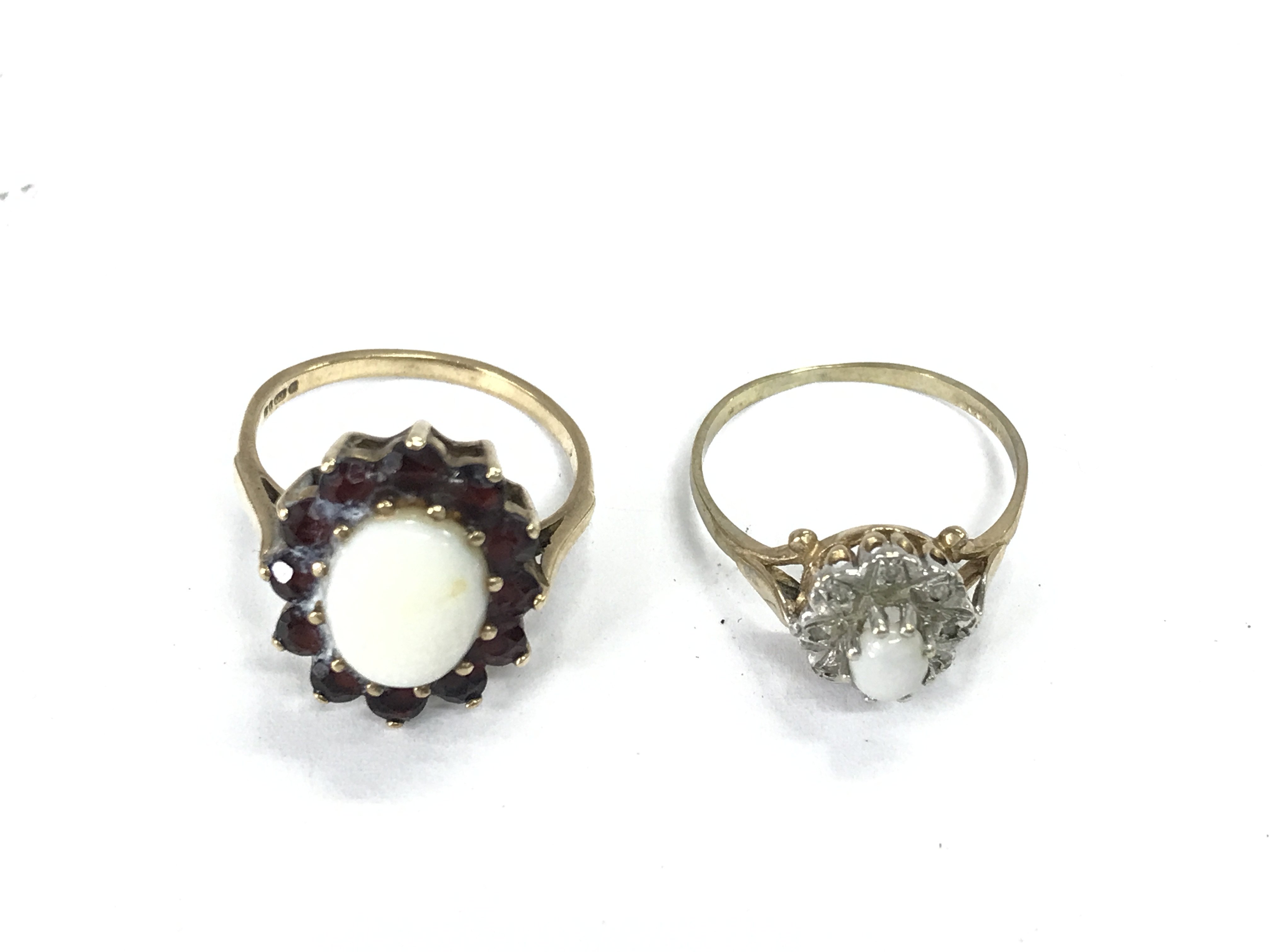 Two 9ct gold rings both set with Opal. 5.15g size O and N 1/2