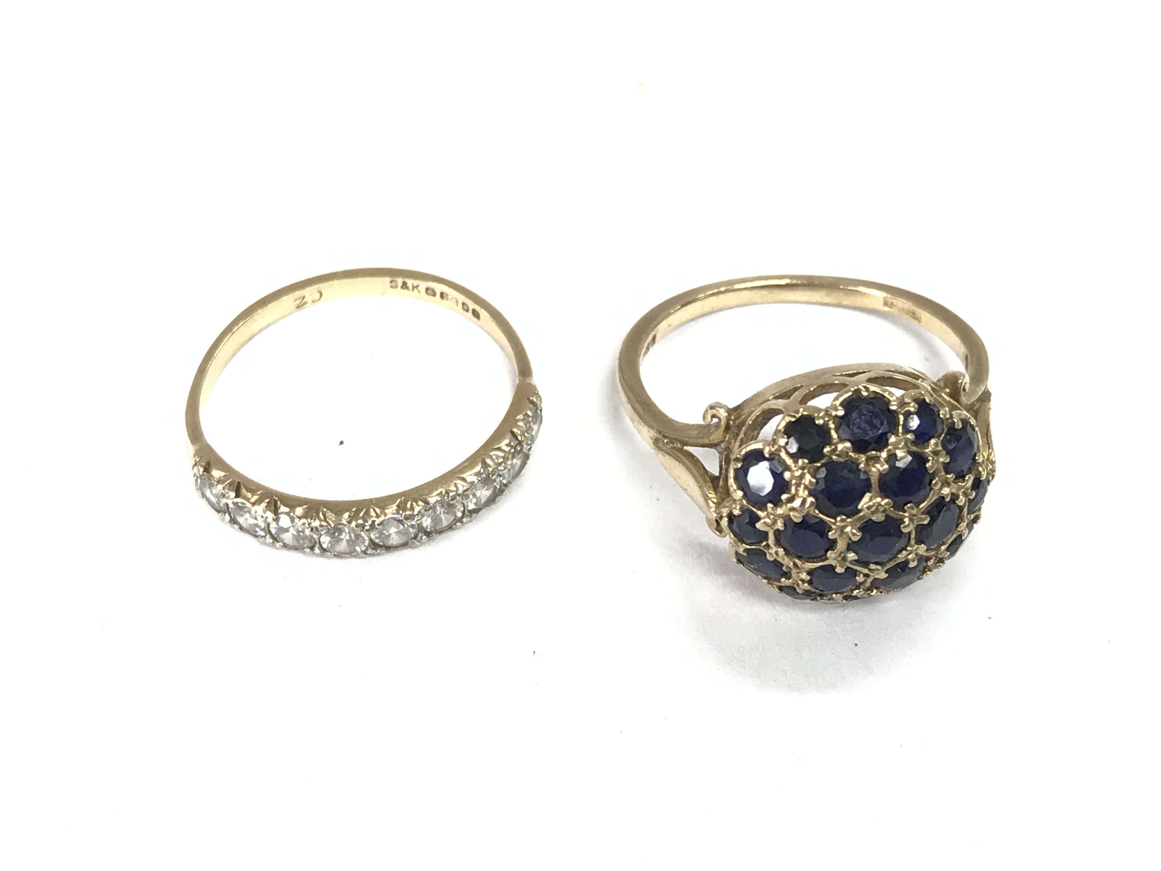 Two 9ct gold rings set with various stones. Size M and L. 4.06g Postage B