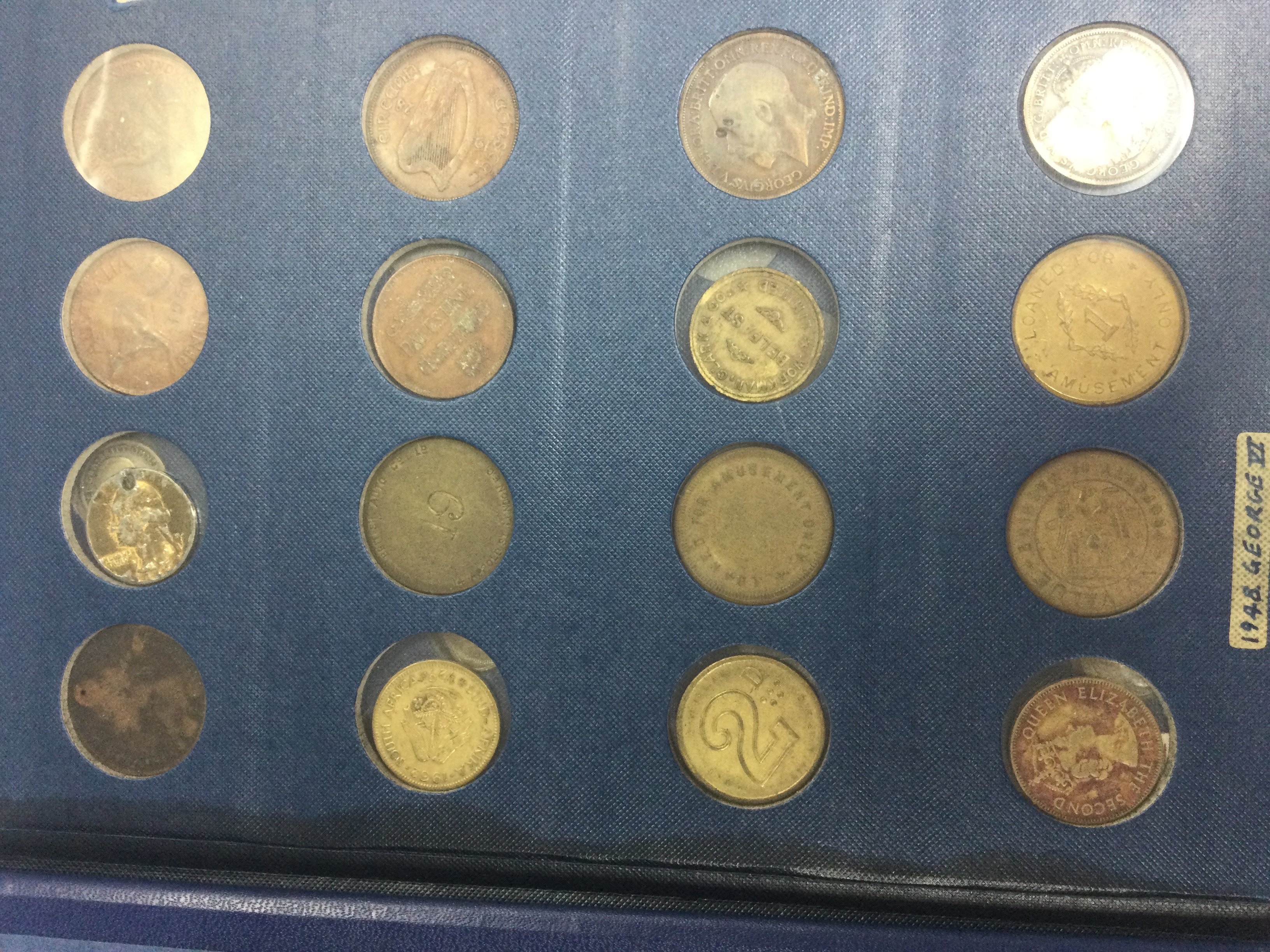 A Album containing various coins various.