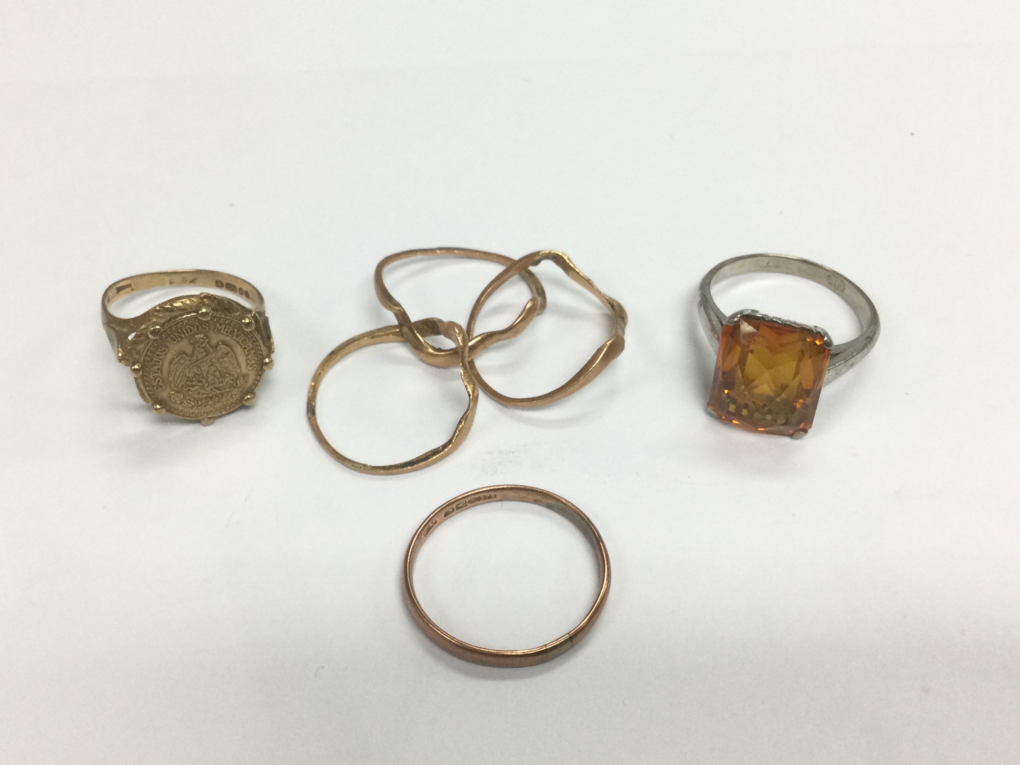 A collection of mainly gold rings. Shipping category A.