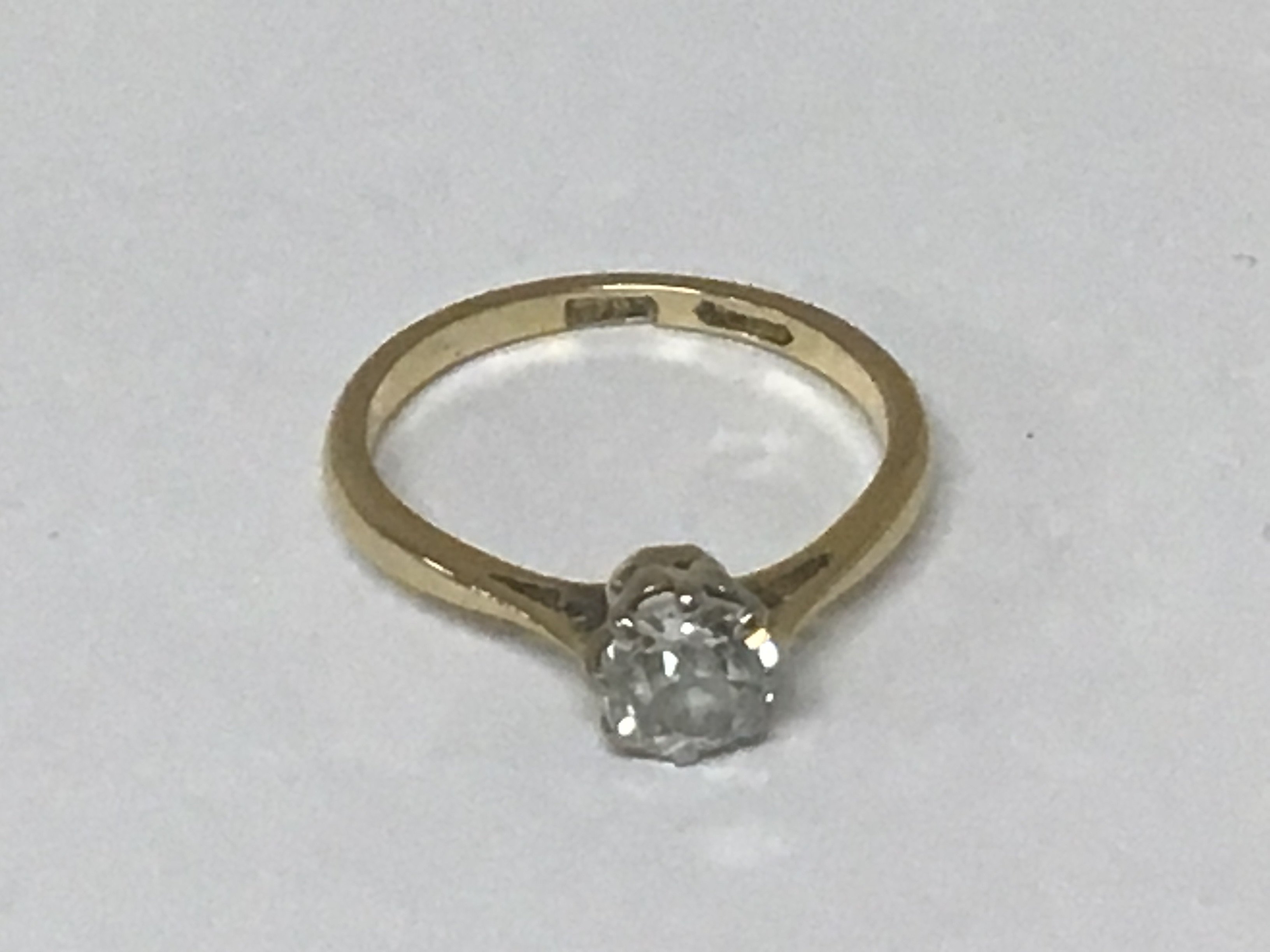 An 18carat gold ring set with an old cut diamond approximately 0.25 of a carat. Total weight 2.2g