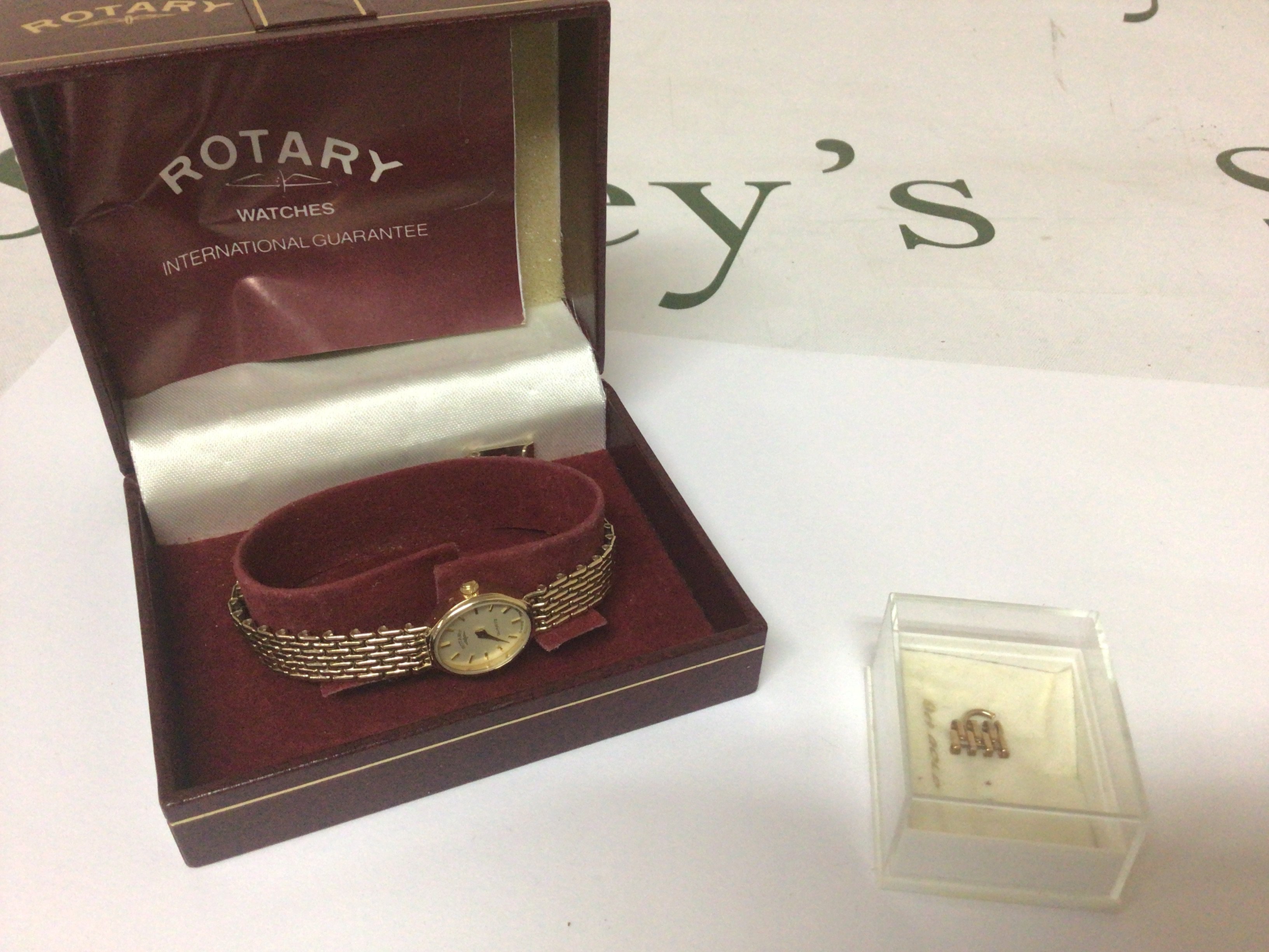 A 9carat ladies Rotary Watch in a fitted box with paperwork and extra link. Weight 15g