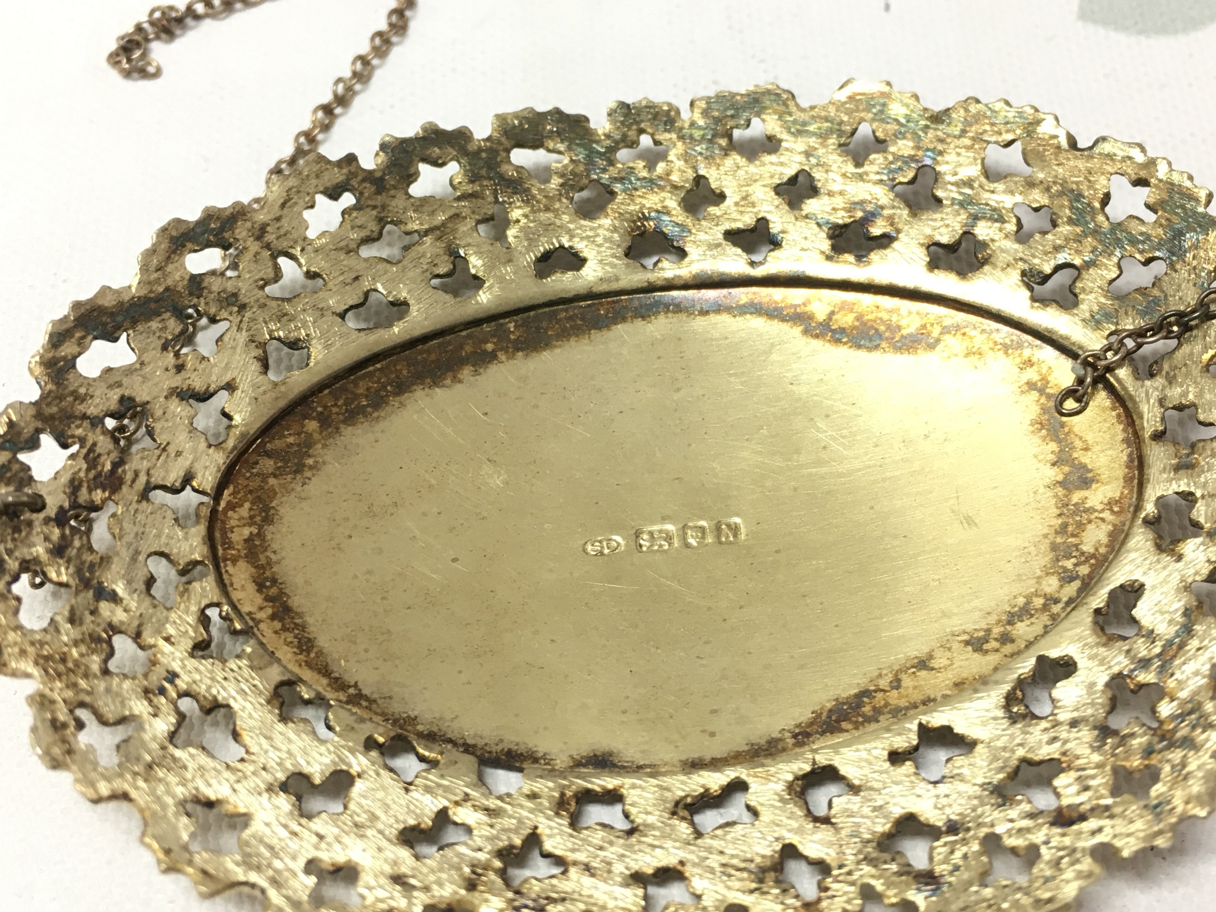 A silver claret decanter label by Stuart Devlin. Postage A