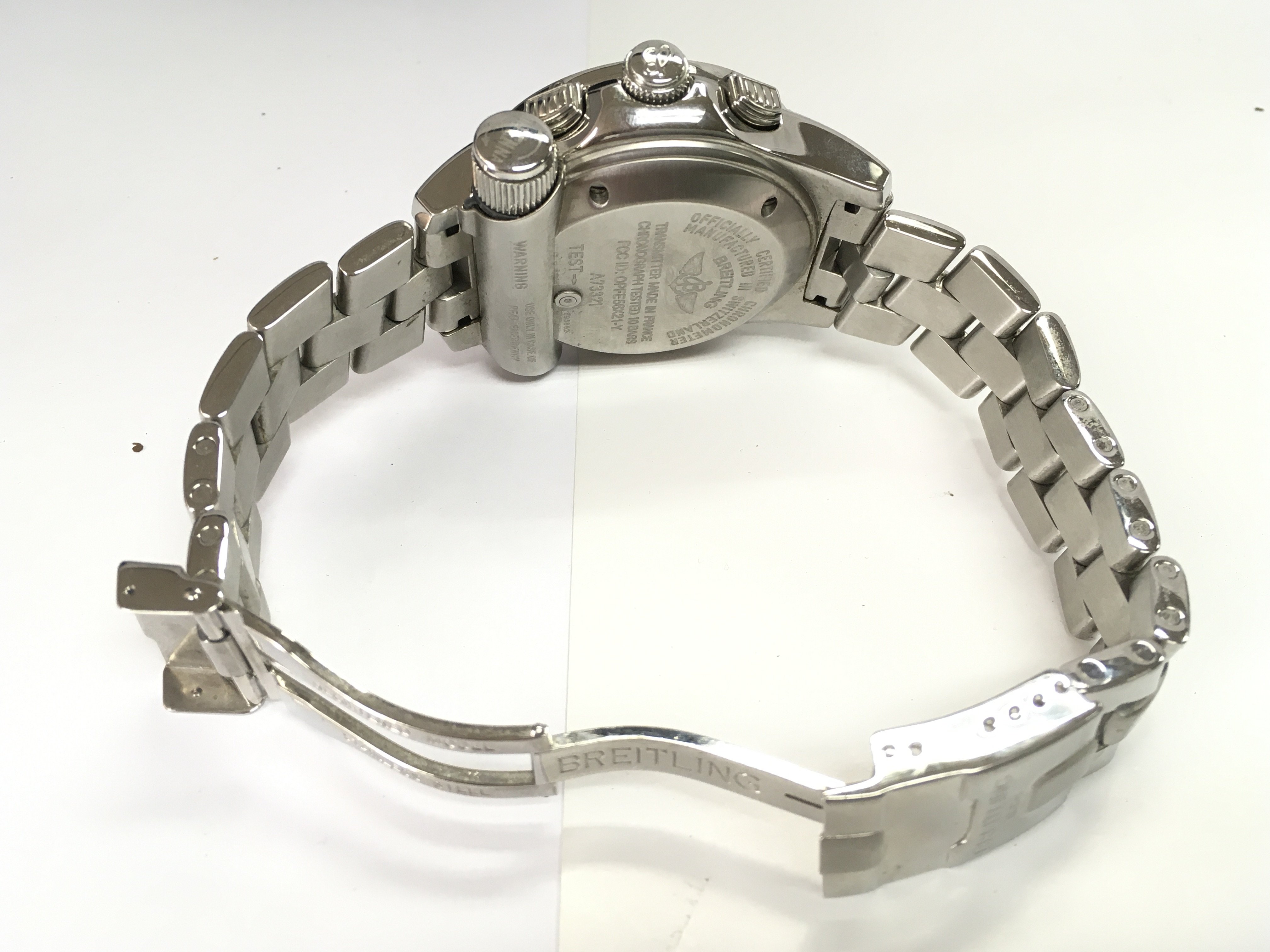 A gents Breitling emergency mission watch with box (missing original inner box) and paperwork. Has service paperwork. 45mm case. Seen running. Postage B