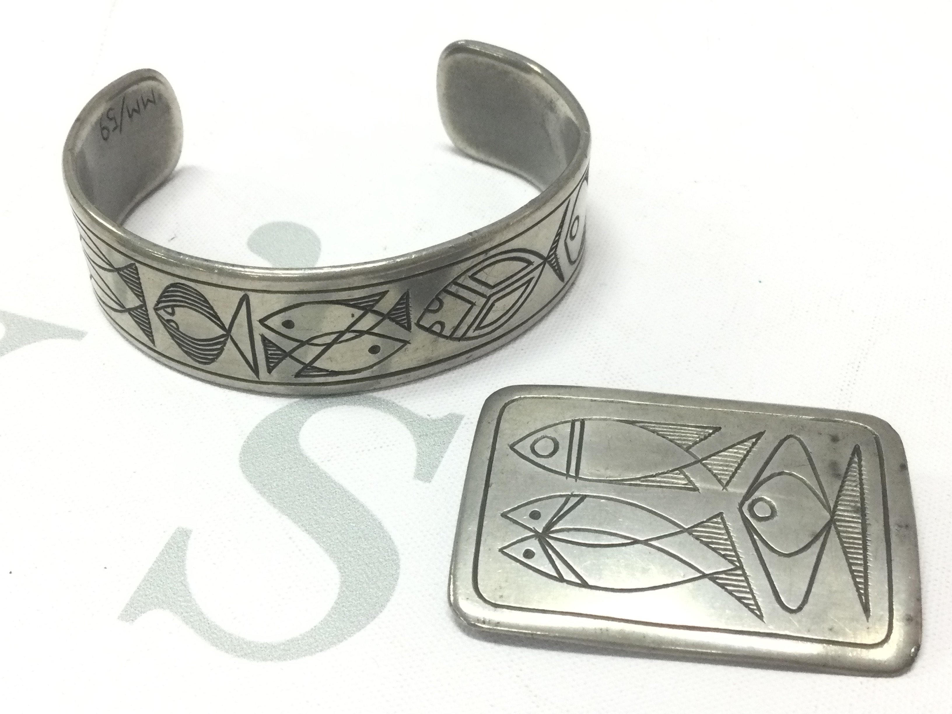 Pewter brooch and bangle , postage category A