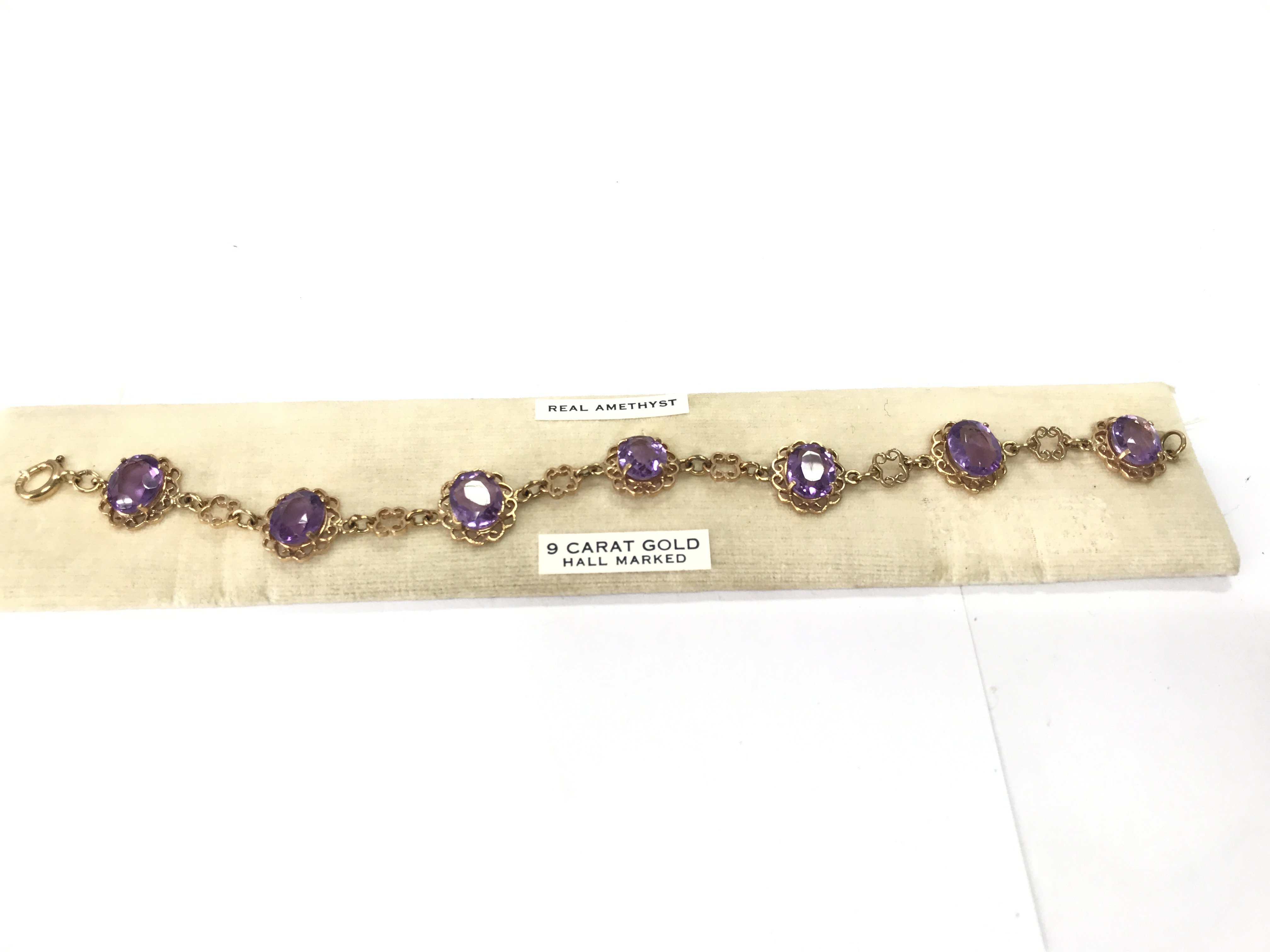 A 9ct gold amethyst bracelet. 11.62g