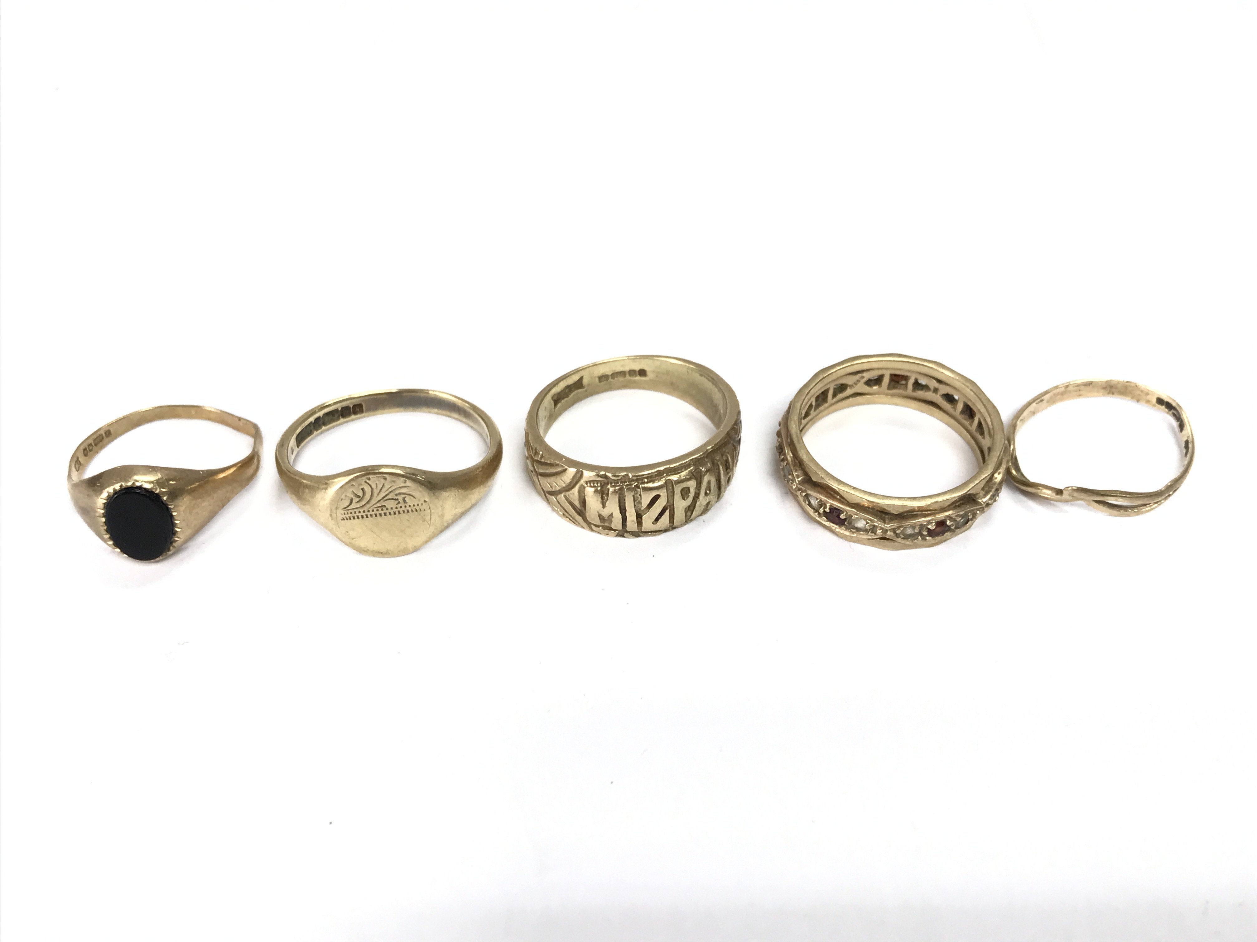 5 9ct gold rings of various designs. 16.35g Postage A