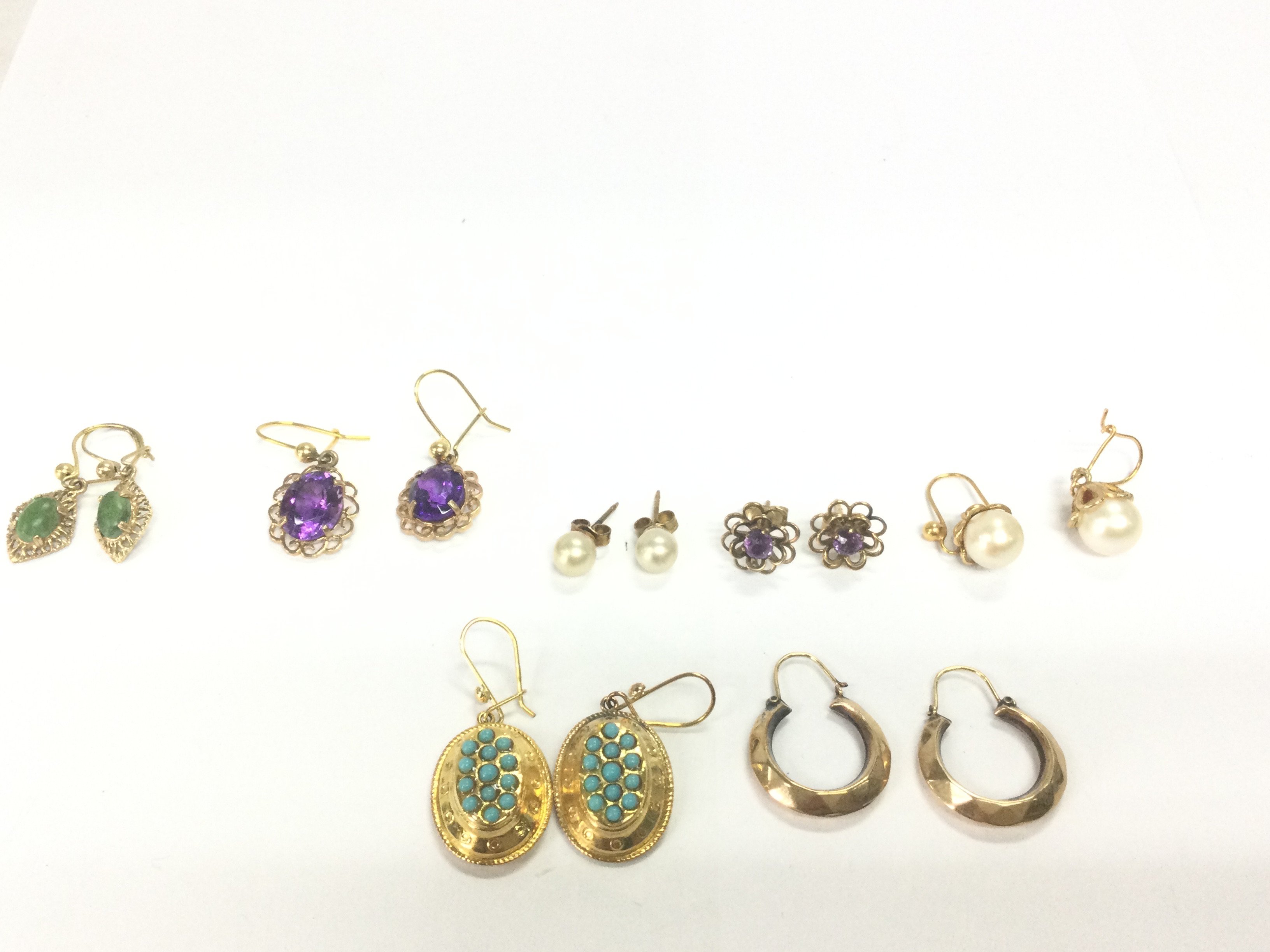 A collection of assorted earrings including 6 9ct gold hallmarked pairs weight 12.50g Postage A