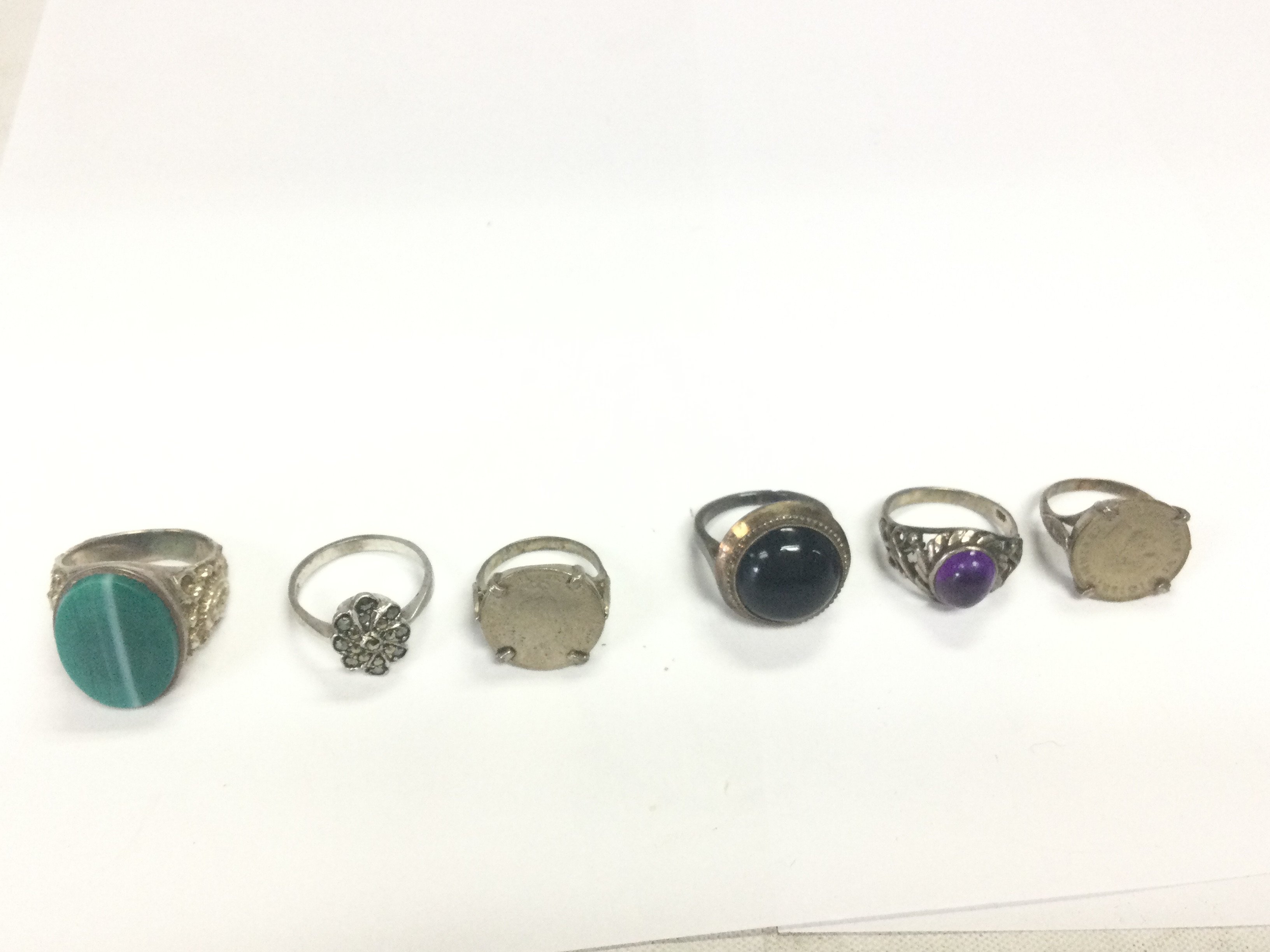 A collection of 6 silver rings of various designs. 27.50g Postage B