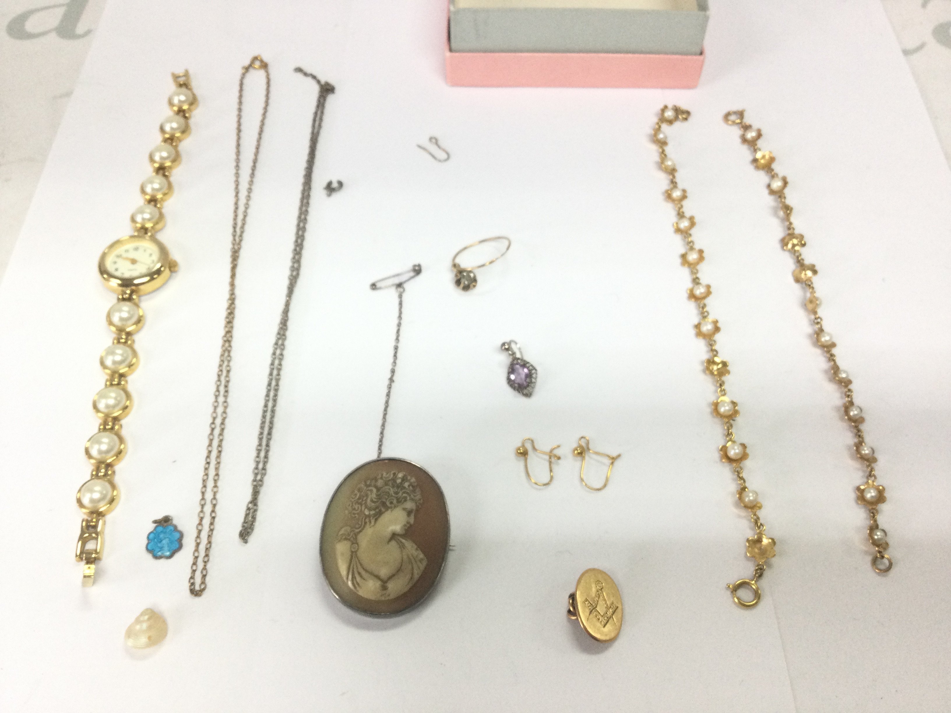 A collection of assorted items including broken 18ct gold cufflink 3.09g a cameo brooch and two silver gilt bracelets. Postage B