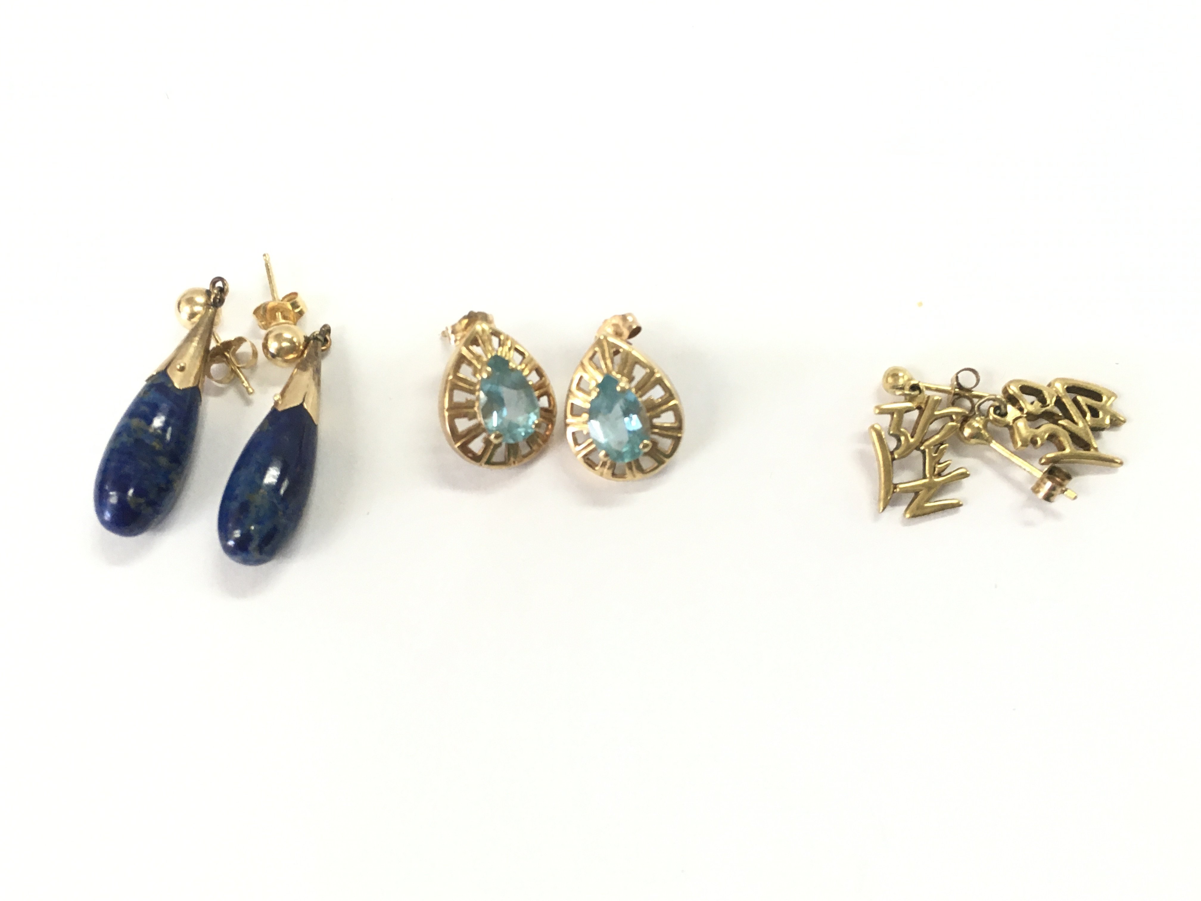 Two 9ct gold pairs of earrings 4.80g and a 14ct pair set with lapis stone 5gPostage A