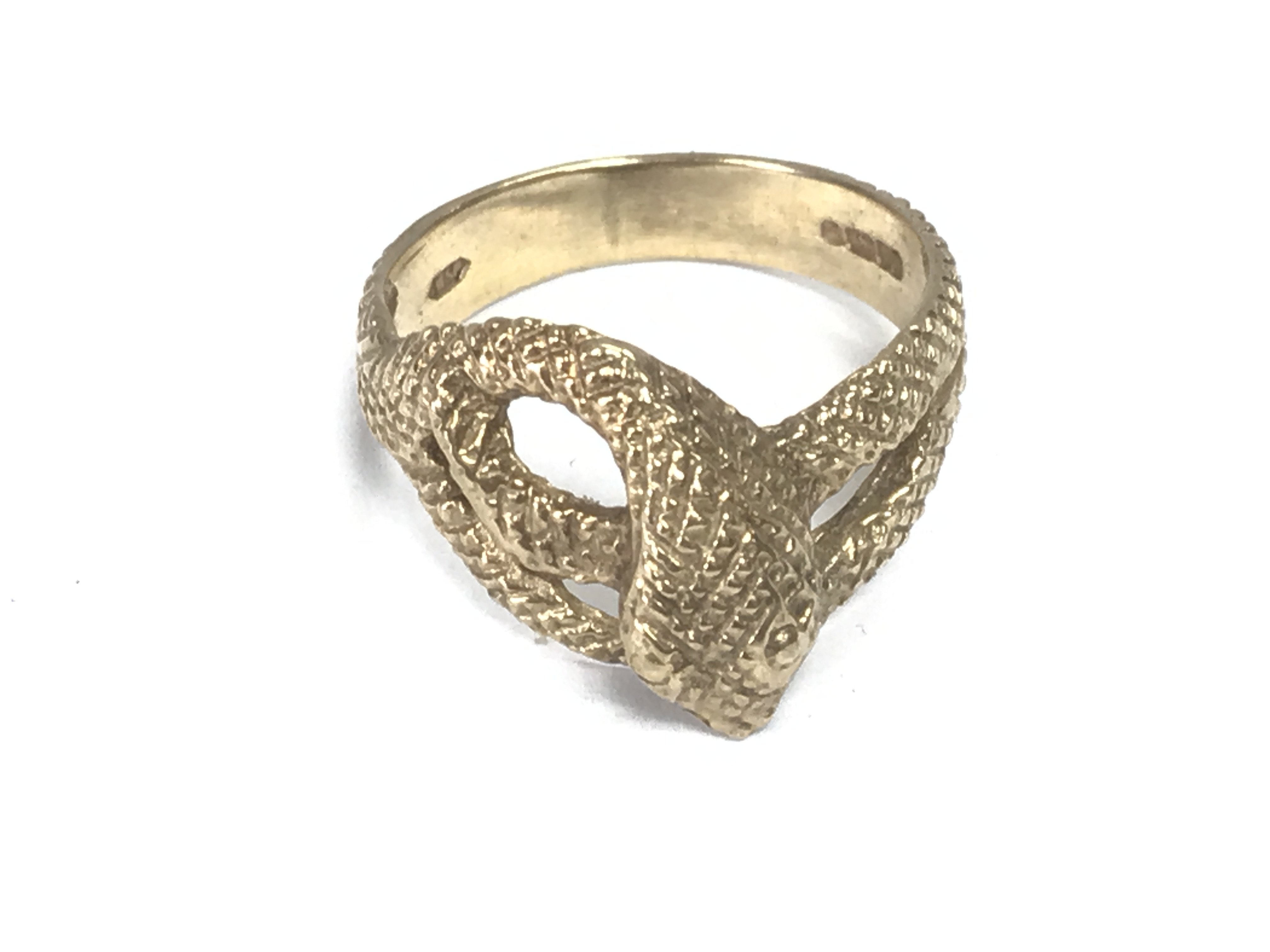 A 9ct ring with snake design. 6.44g and size V