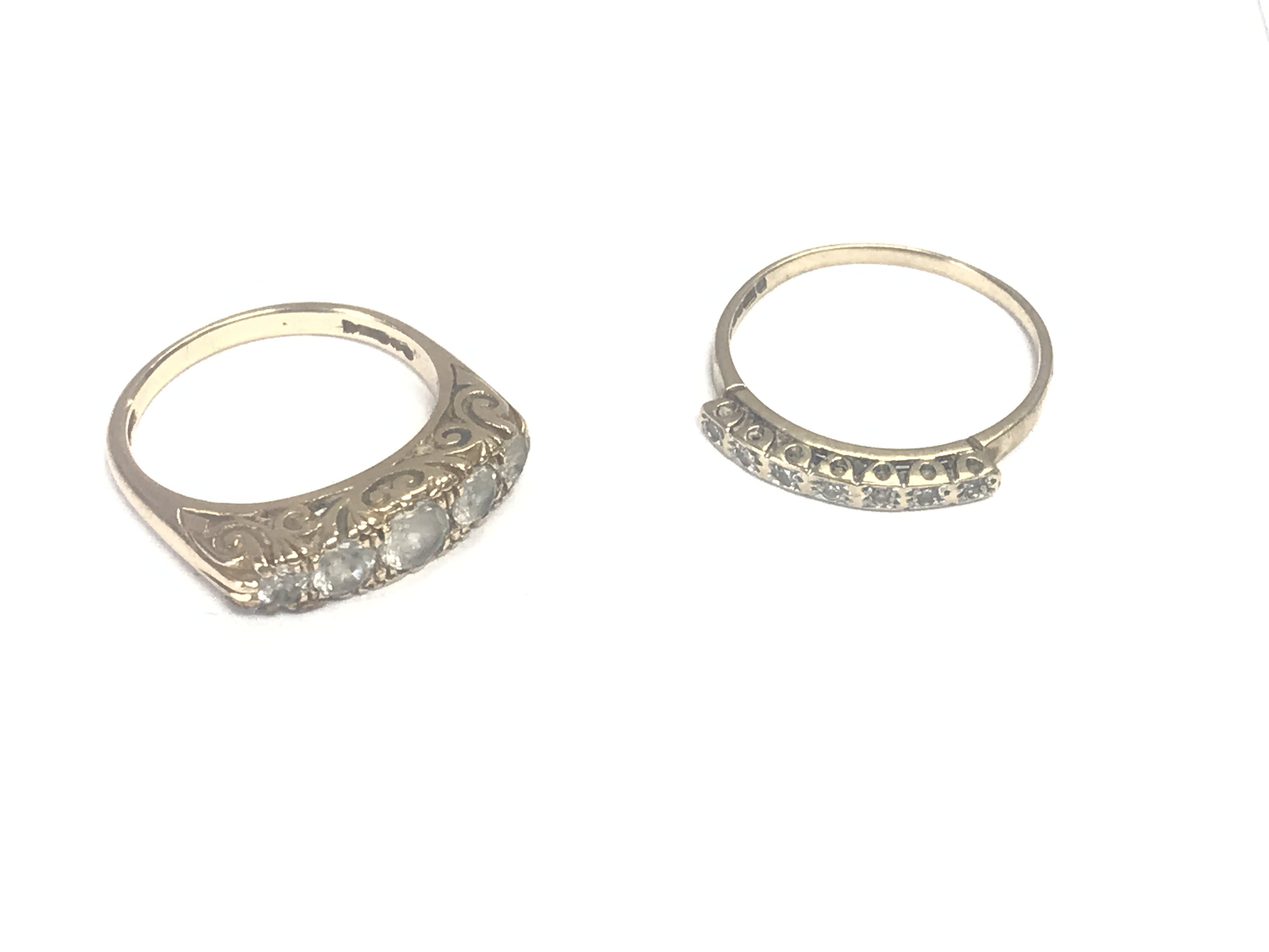 2 ladies 9ct rings, 1 with large stones, 1 with small stones, size n and o, 5.20g