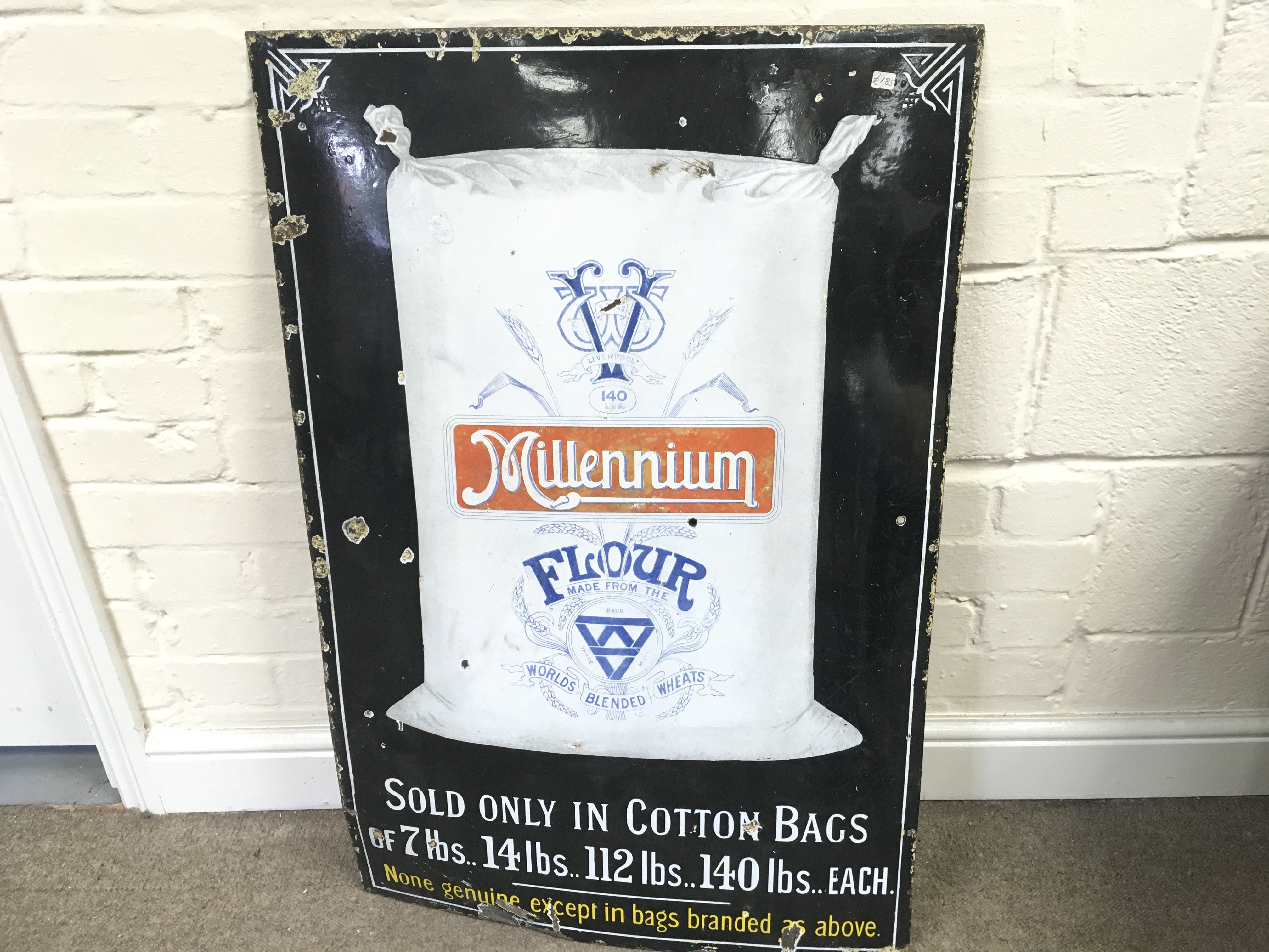 A Millennium Flour enamel sign24 x 36 inches