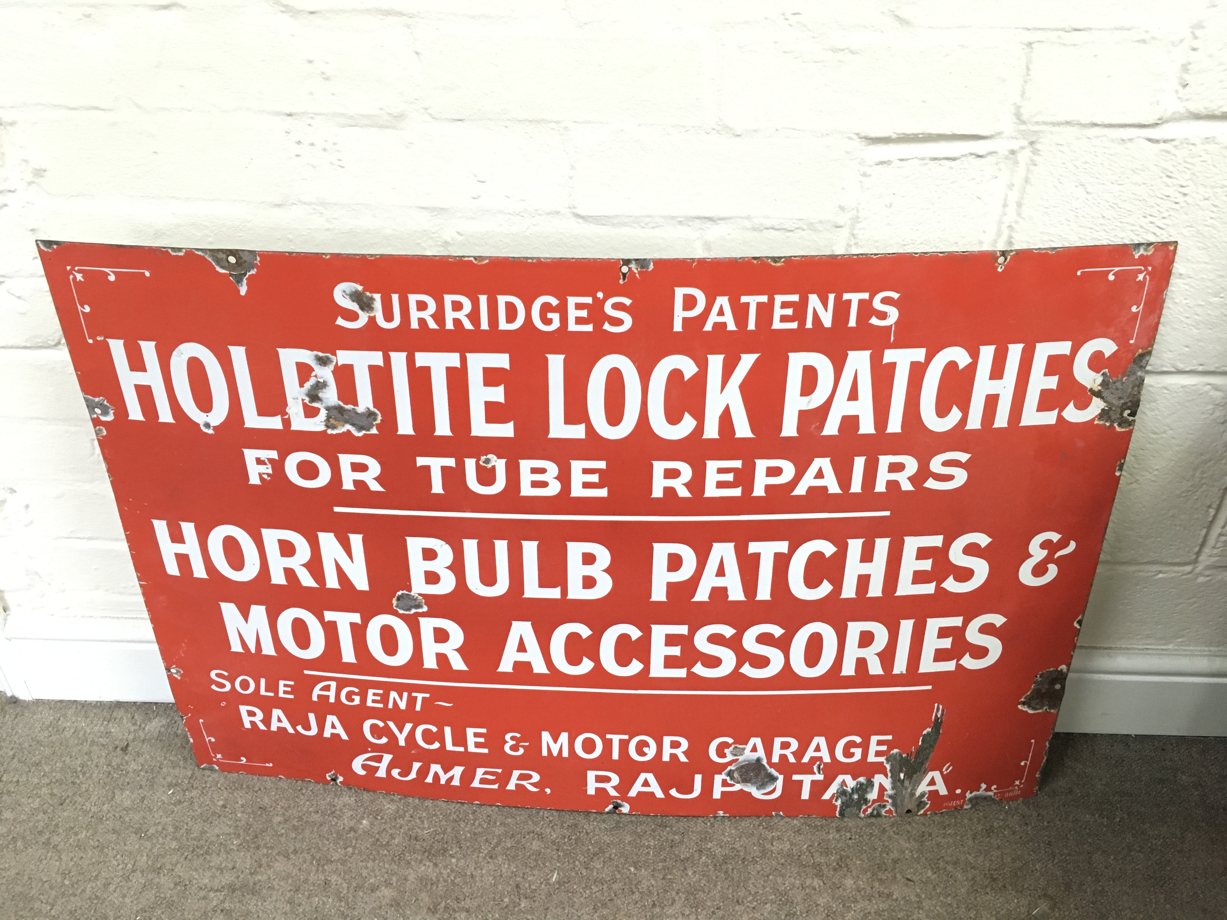 A vintage enamel sign for surridges patents. 36 x 24 inches approximately