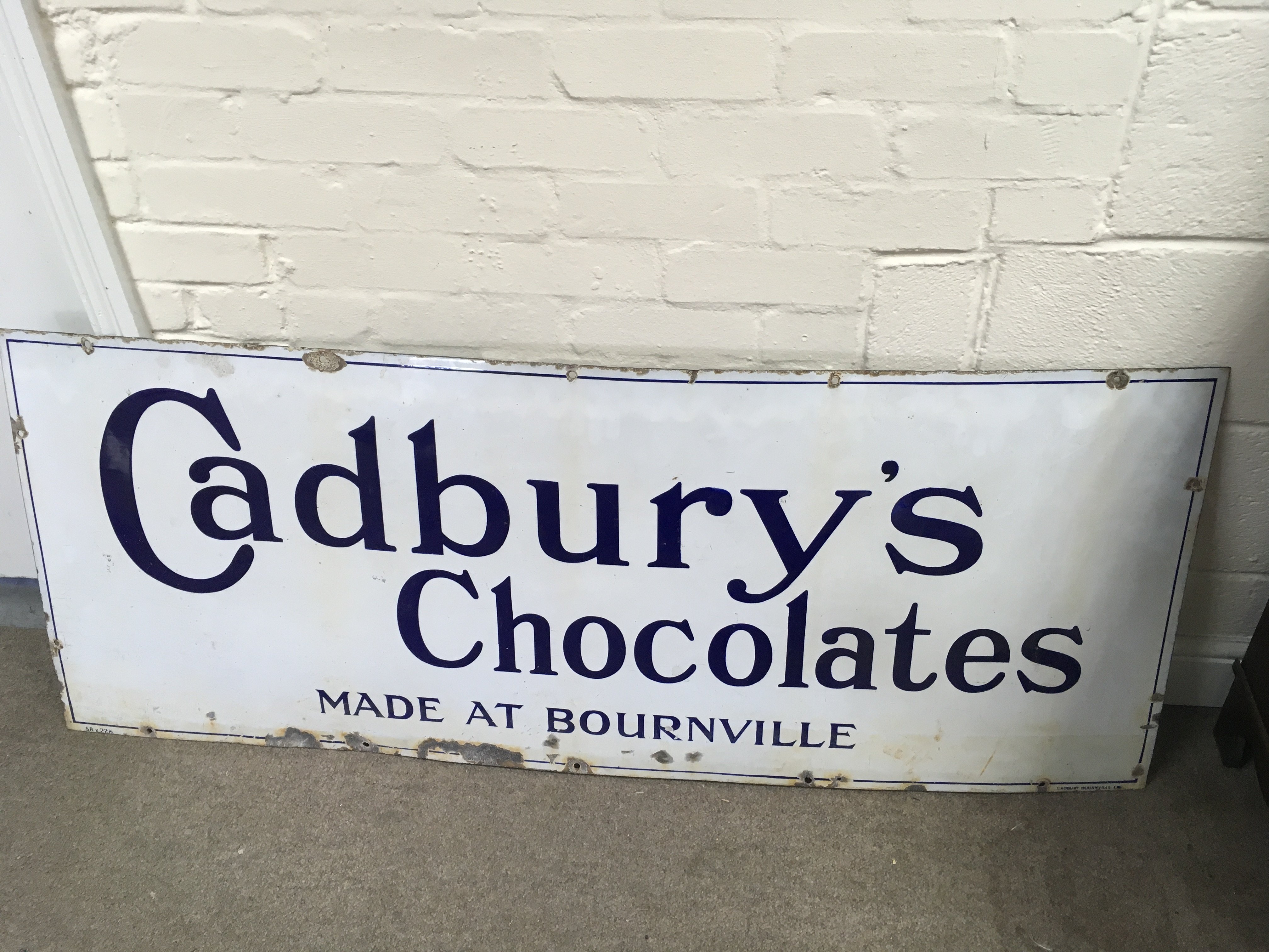 Cadbury chocolates made at bournville enamel sign 58 x 23 inches approximately