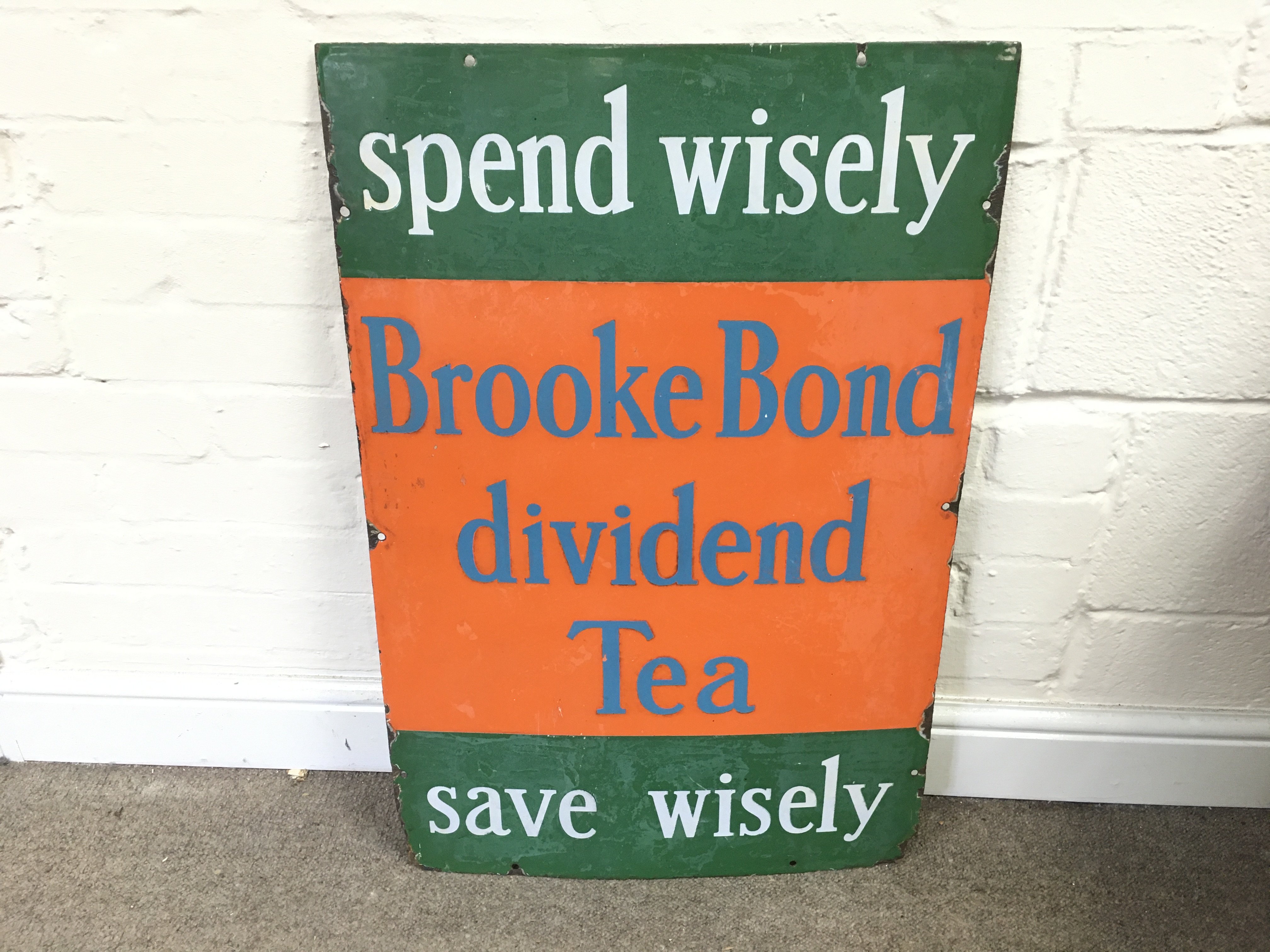 A vintage 'Spend Wisely Brooke Bond divided Tea Save Wisely' advertising enamel sign 20 x 30 inches