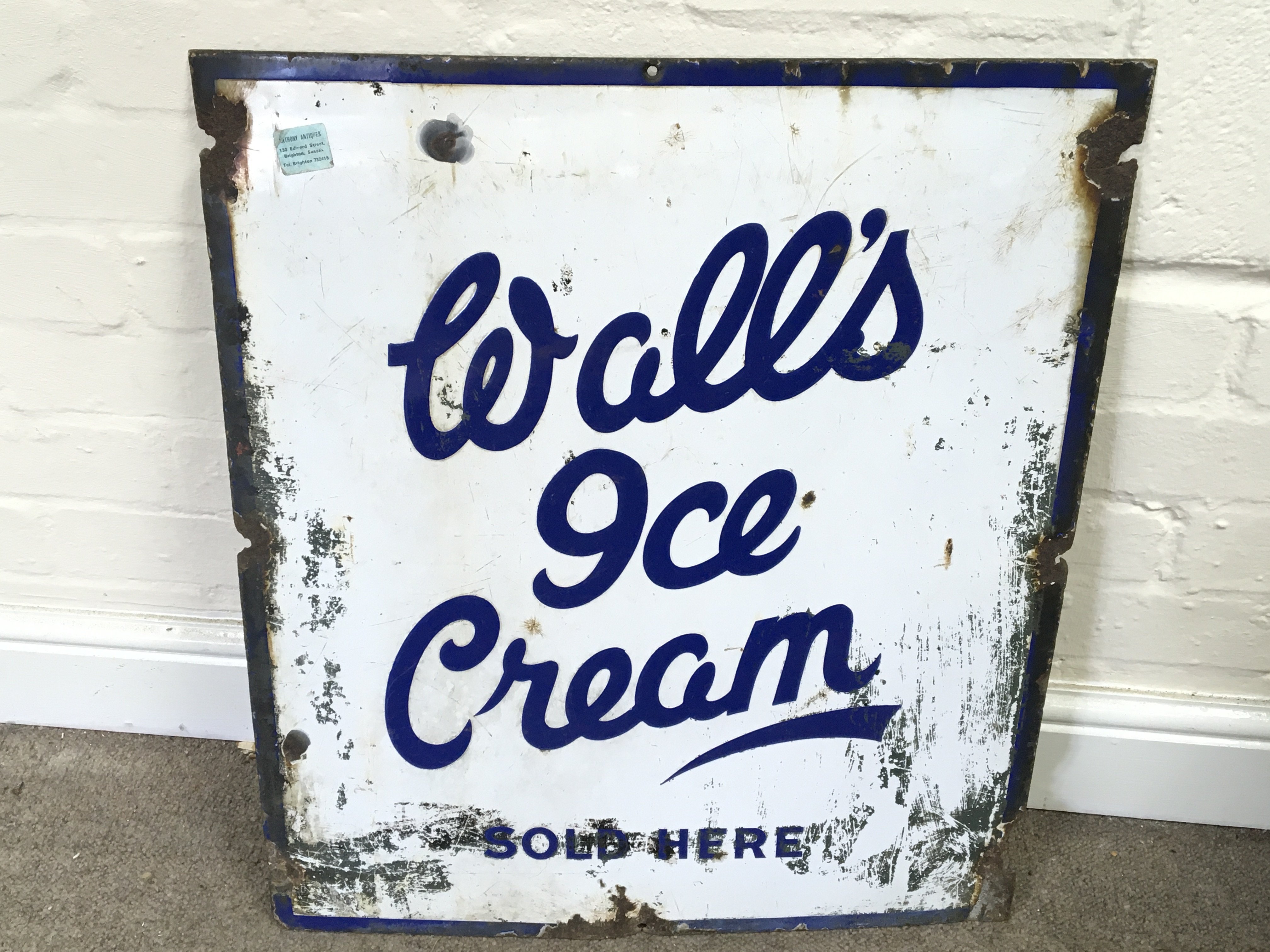 A walls ice cream sold here sign. 21 x 24 inches approximately