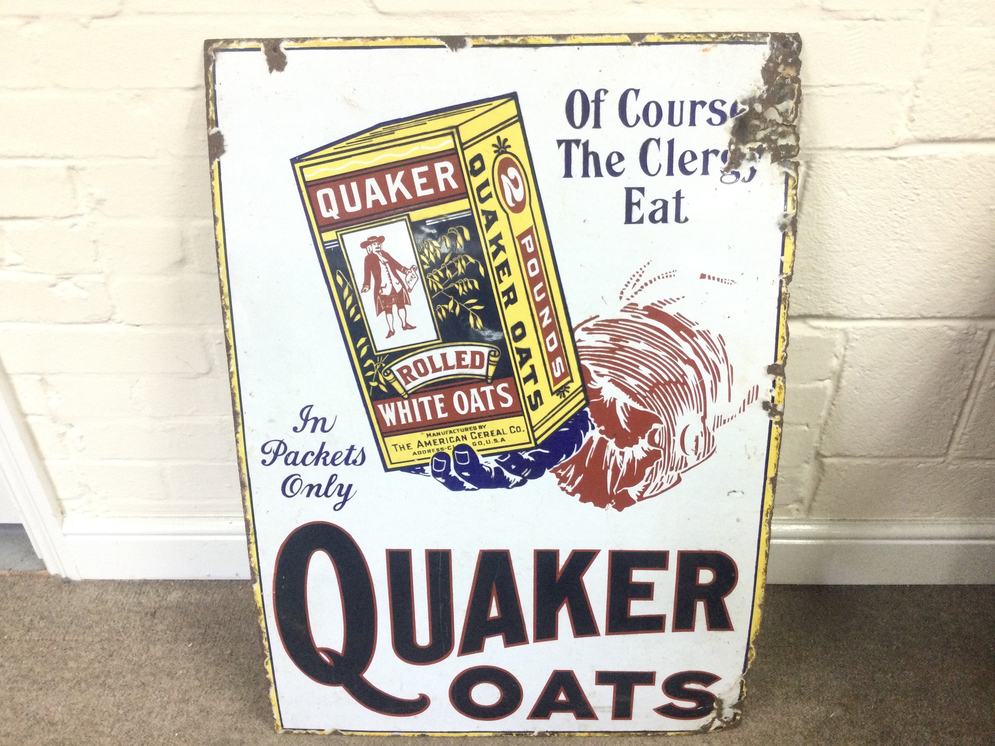 A 'Quaker Oats' enamel advertising sign 24 x 34 inches approximately