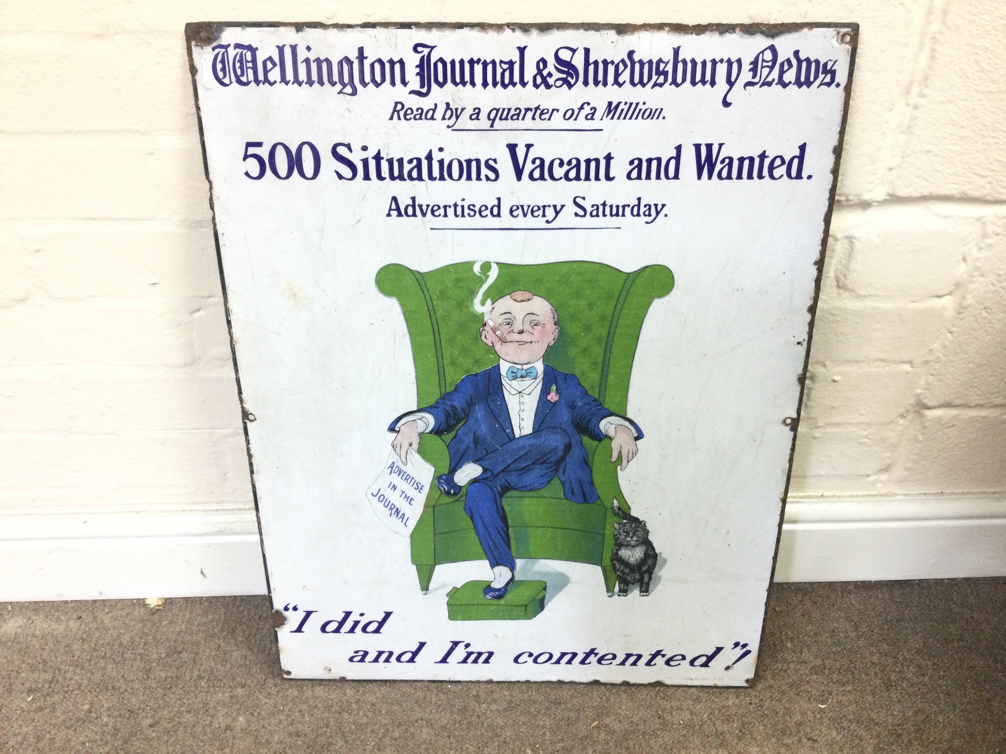 Antique Wellington Journal Pictorial Enamel Sign. 19 x 25 inches