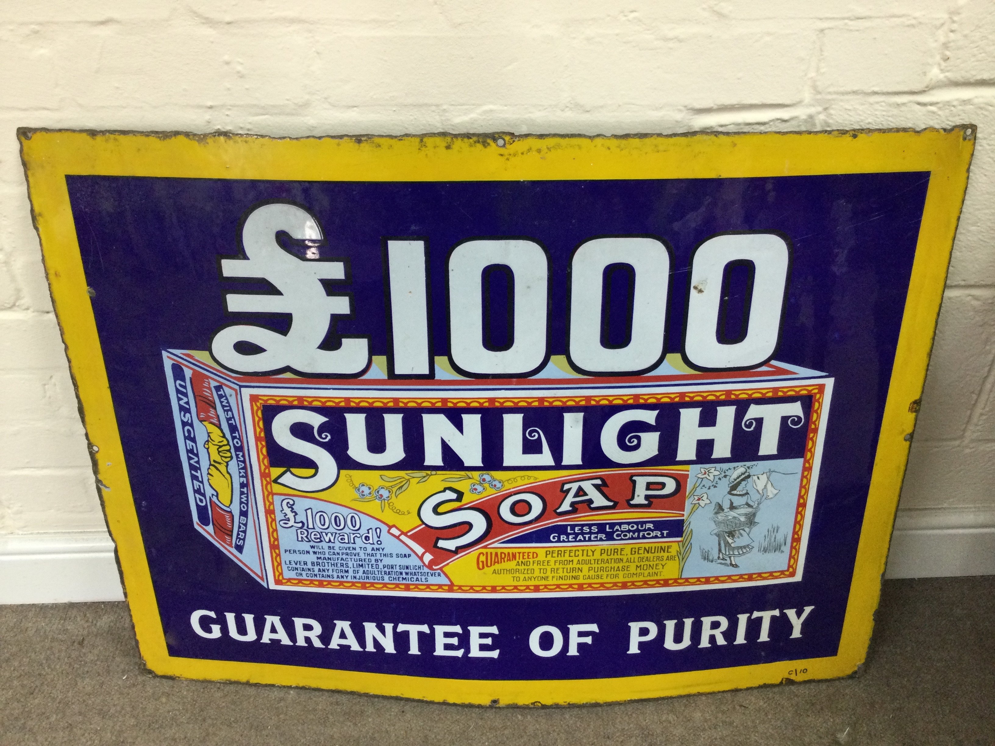 A Sunlight Soap enamel sign 36 x 27 inches