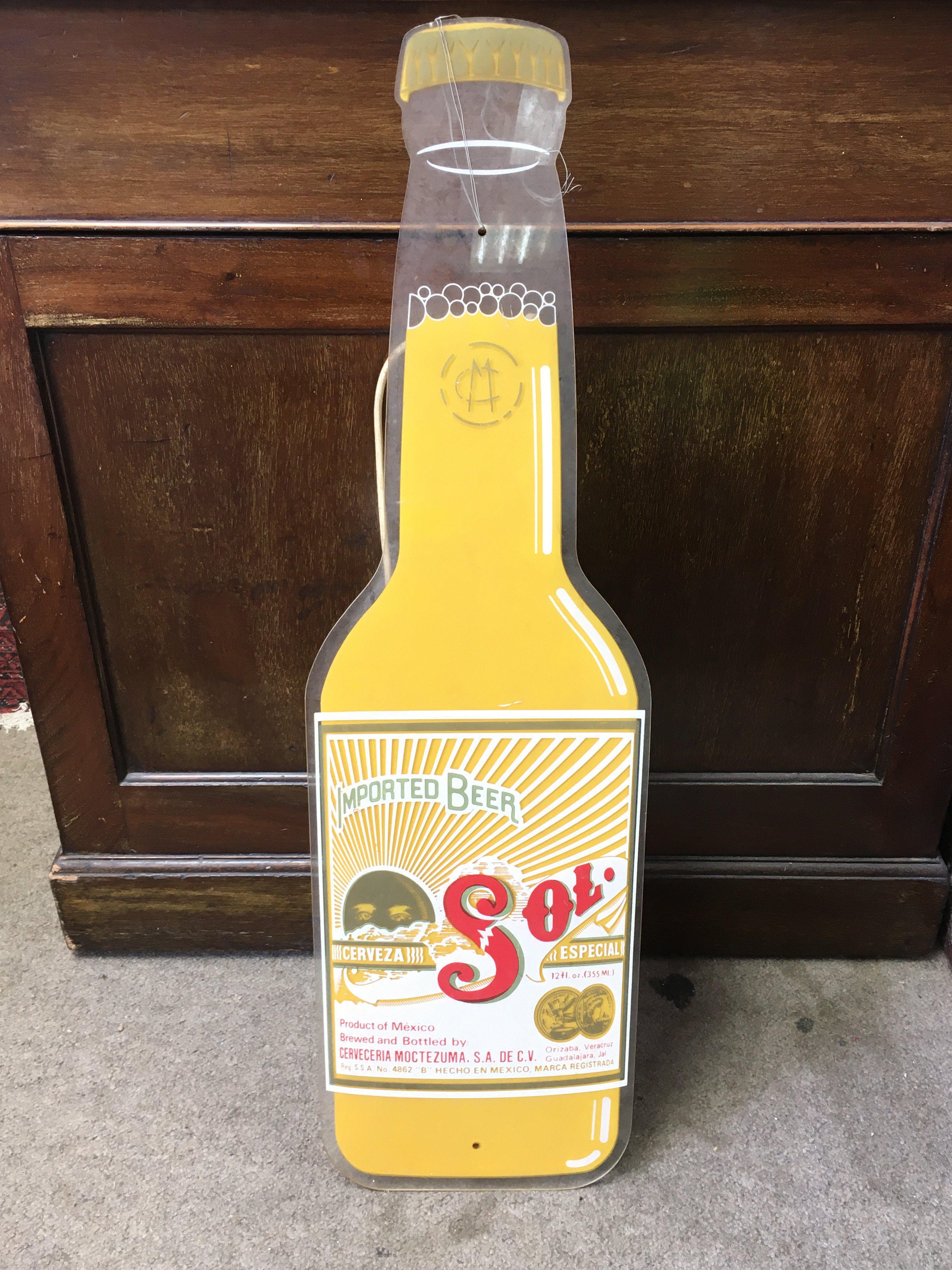 A Vintage Sol imported beer light up advertising sign. 76cm tall 22cm wide .This lot cannot be posted