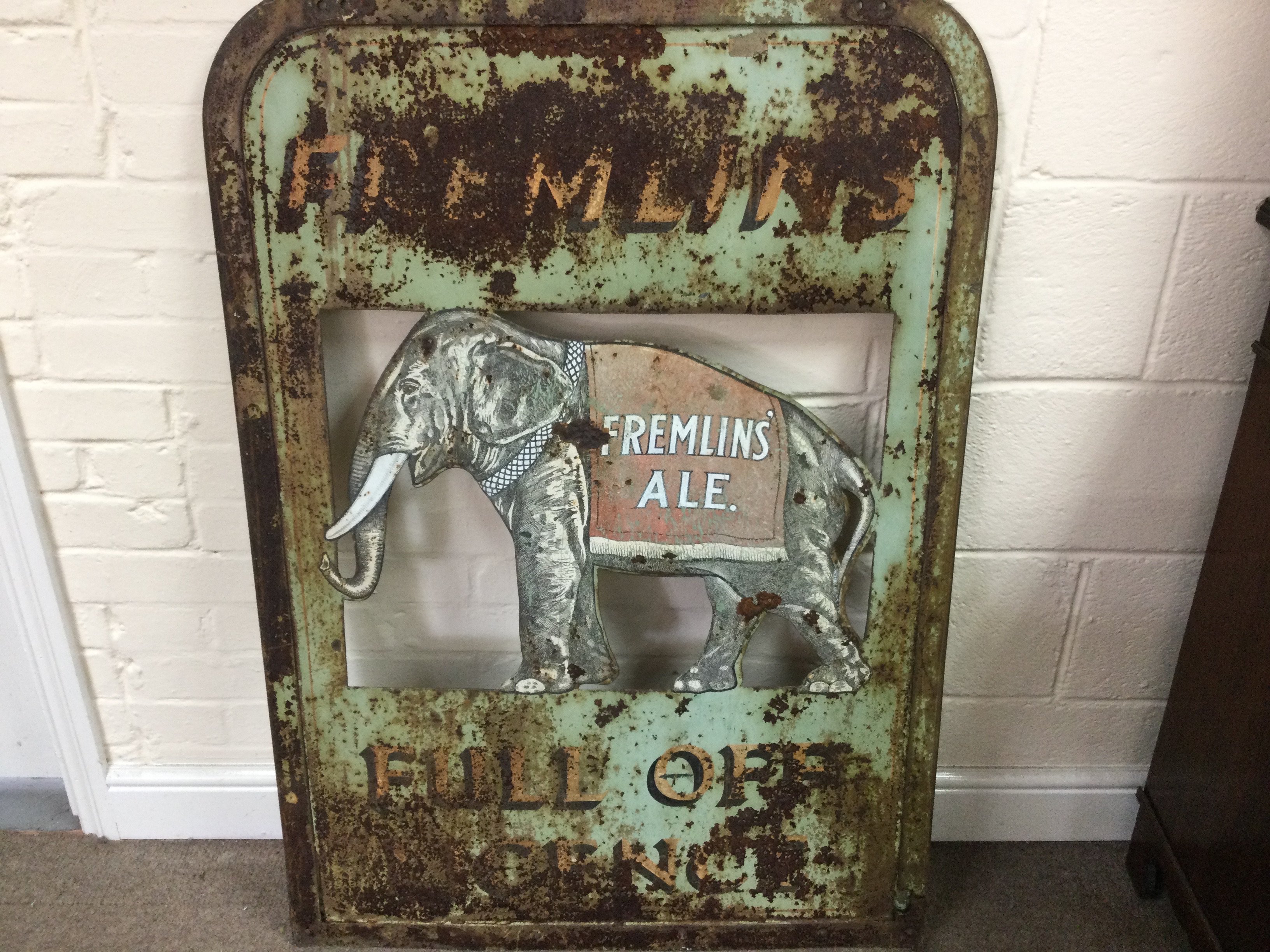 A large vintage fremlins tavern sign. 31 x 44 inches approximately