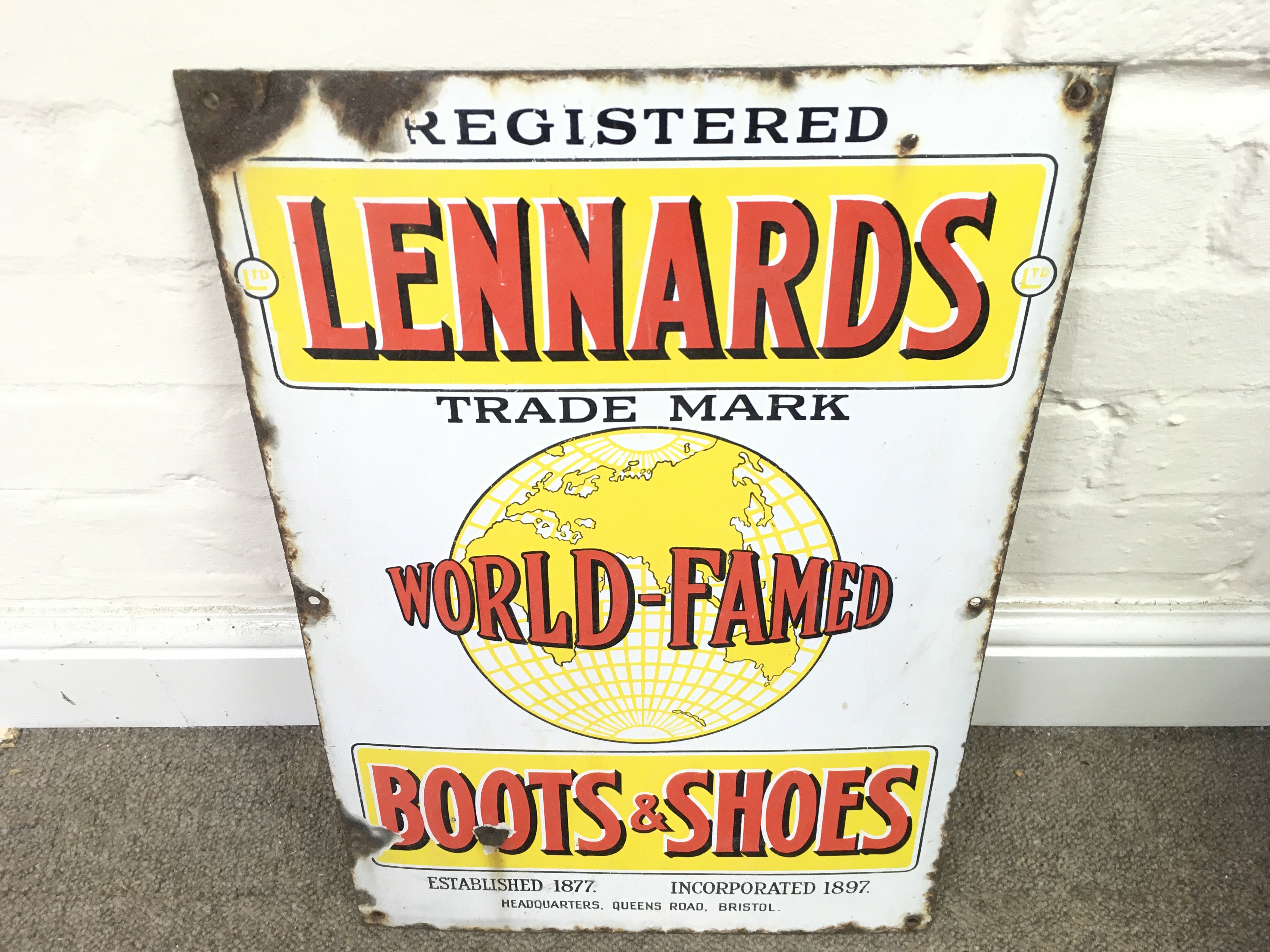 vintage advertising enamel sign 'Lennards World Famed Boots and Shoes. 13.5 x 19.5 inches approximately