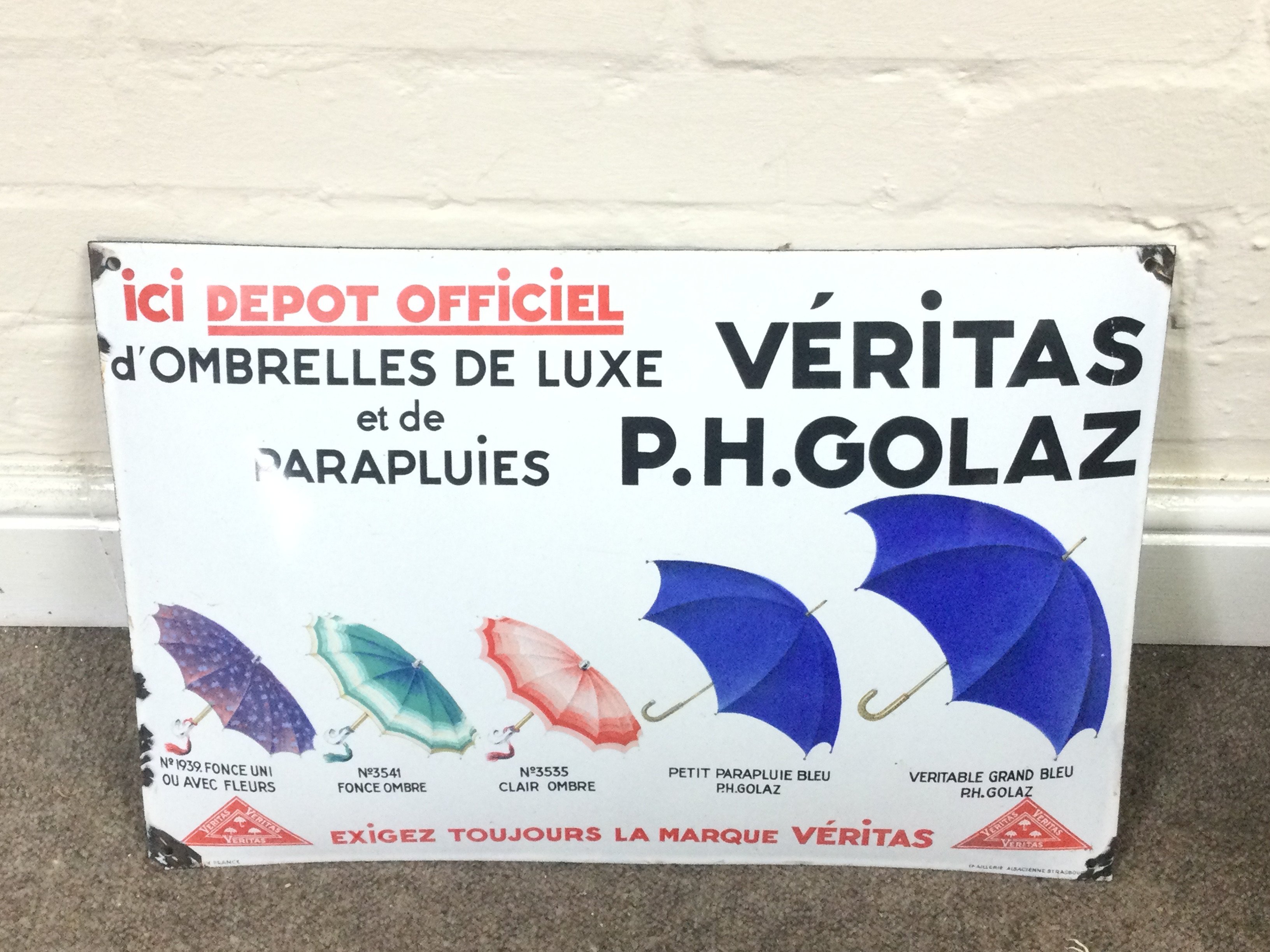 GOLAZ Luxury Umbrellas and Umbrellas Enamel sign. 19.5 x 13 inches approximately