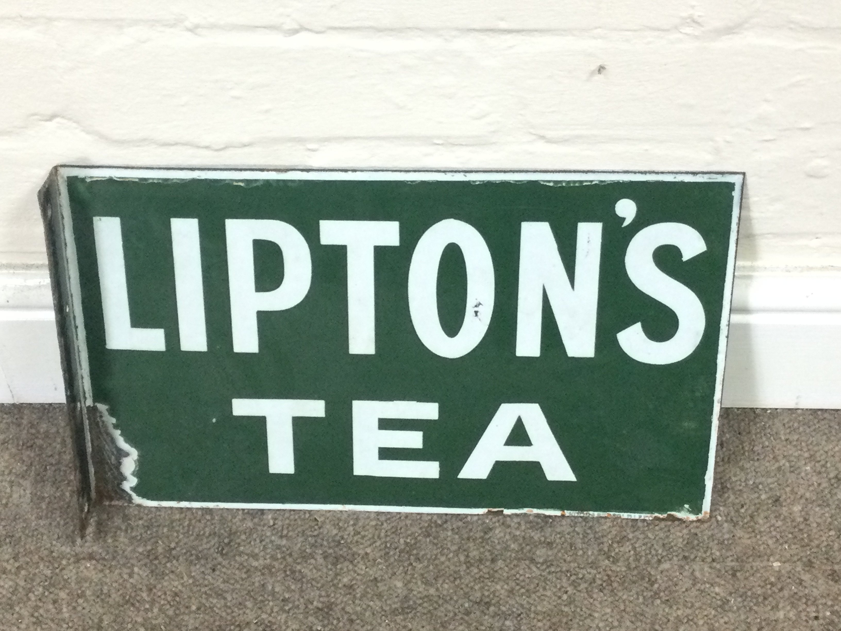 Lipton's Tea, a double sided flanged enamel advertising sign 15 x 9 inches approximately