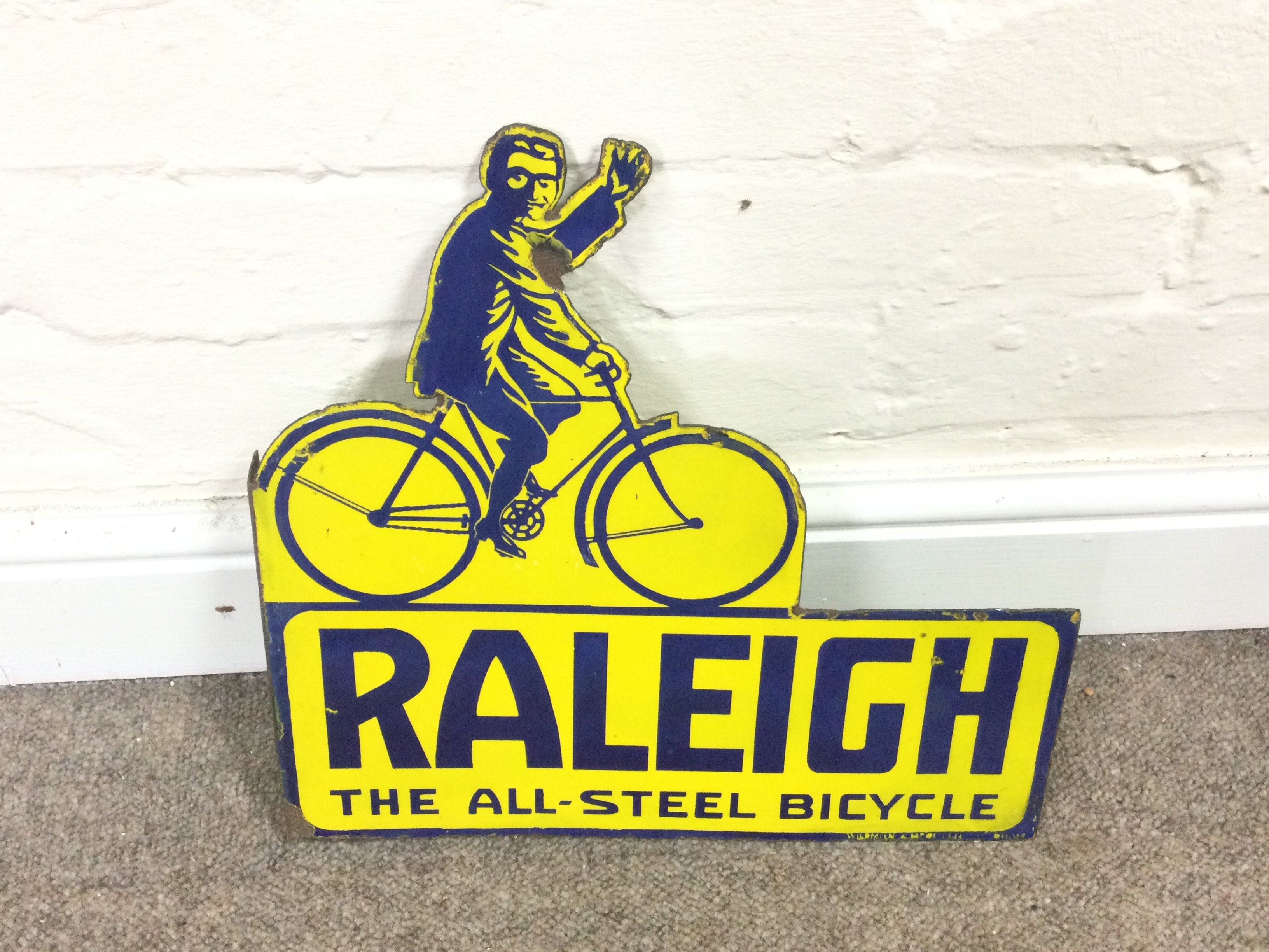 Rayleigh cycles cut out enamel sign 14 x 13.5 inches approximately