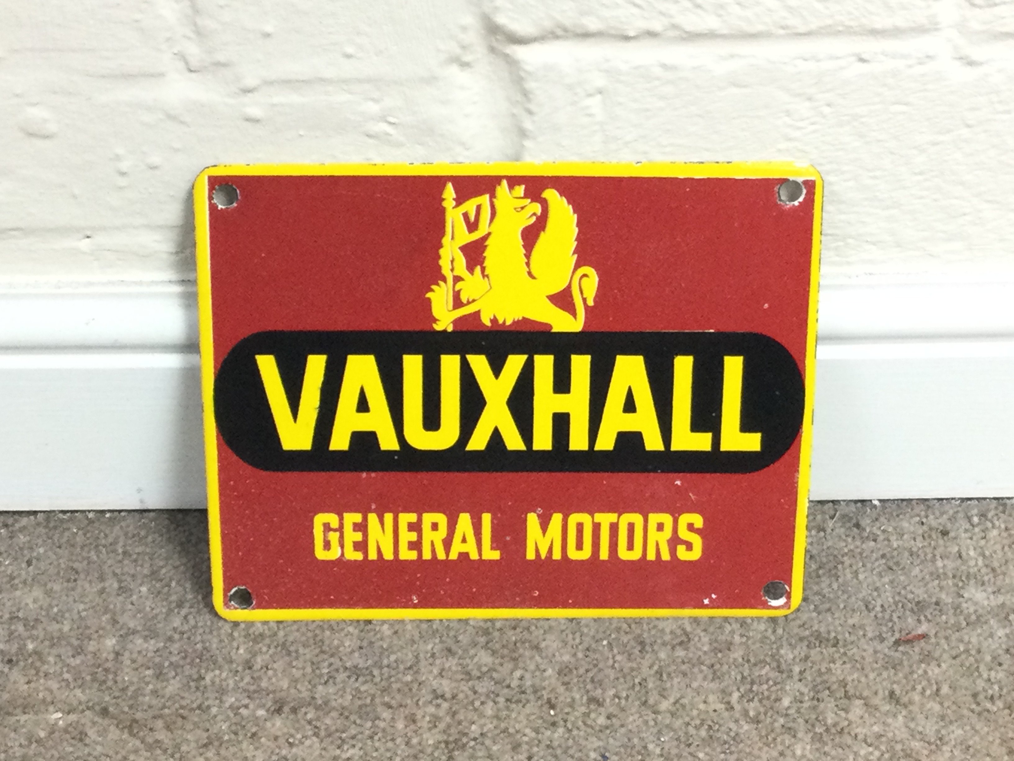 A Vauxhall General Motors enamel sign. 10 x 8 inches approximately