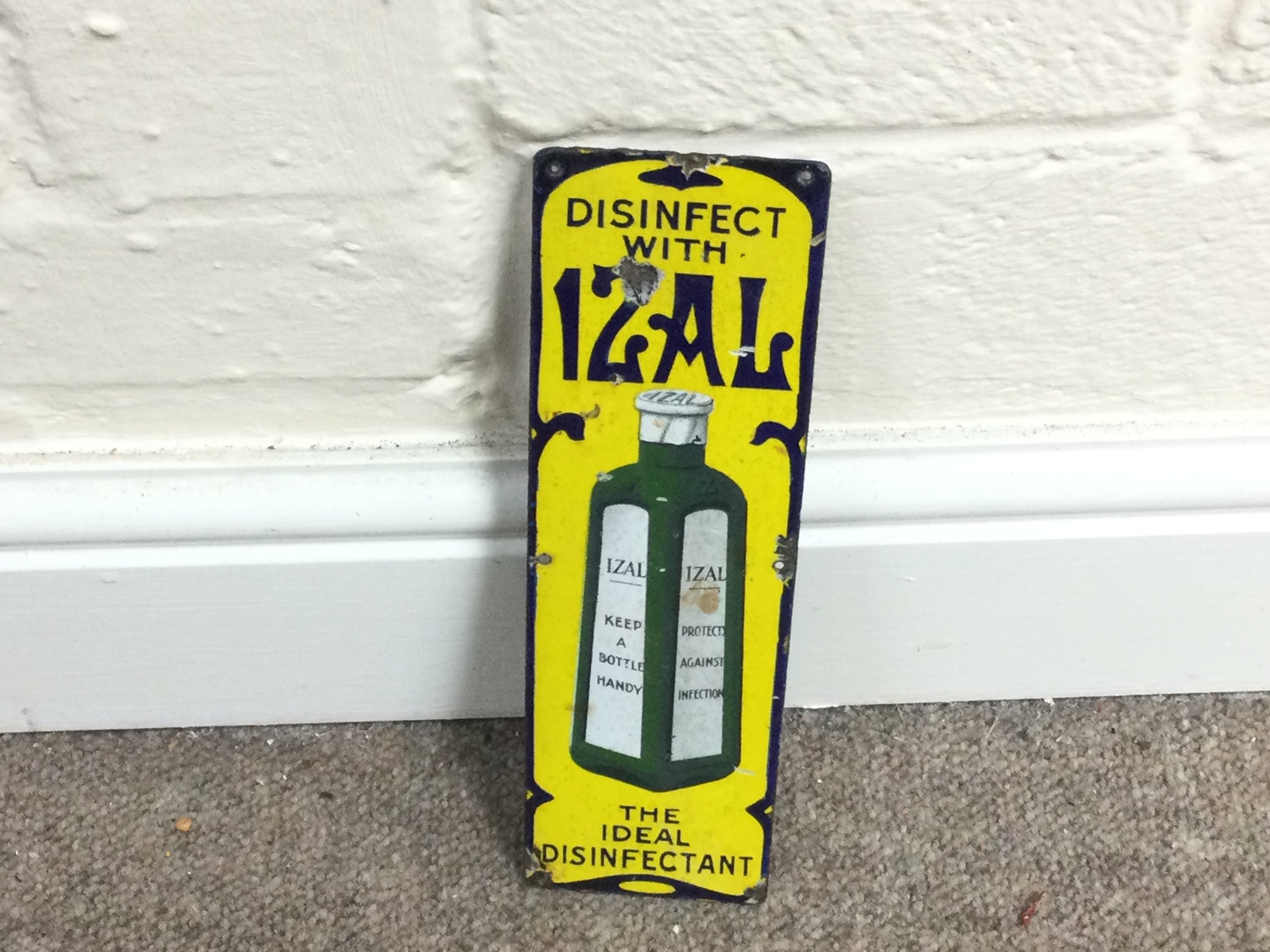 IZAL DISINFECTANT ENAMEL SIGN. 3 x 10 inches approximately