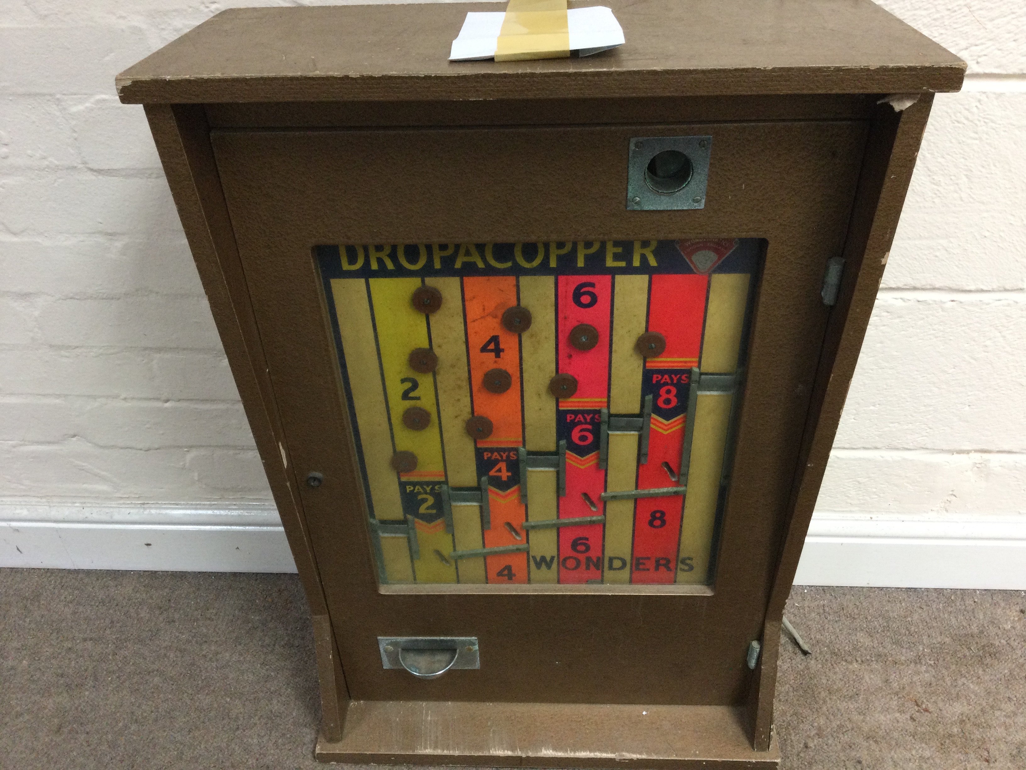 Wonder machine 'Drop a Copper' penny arcade gaming machine 32 x 20 x 9.5inches approximately