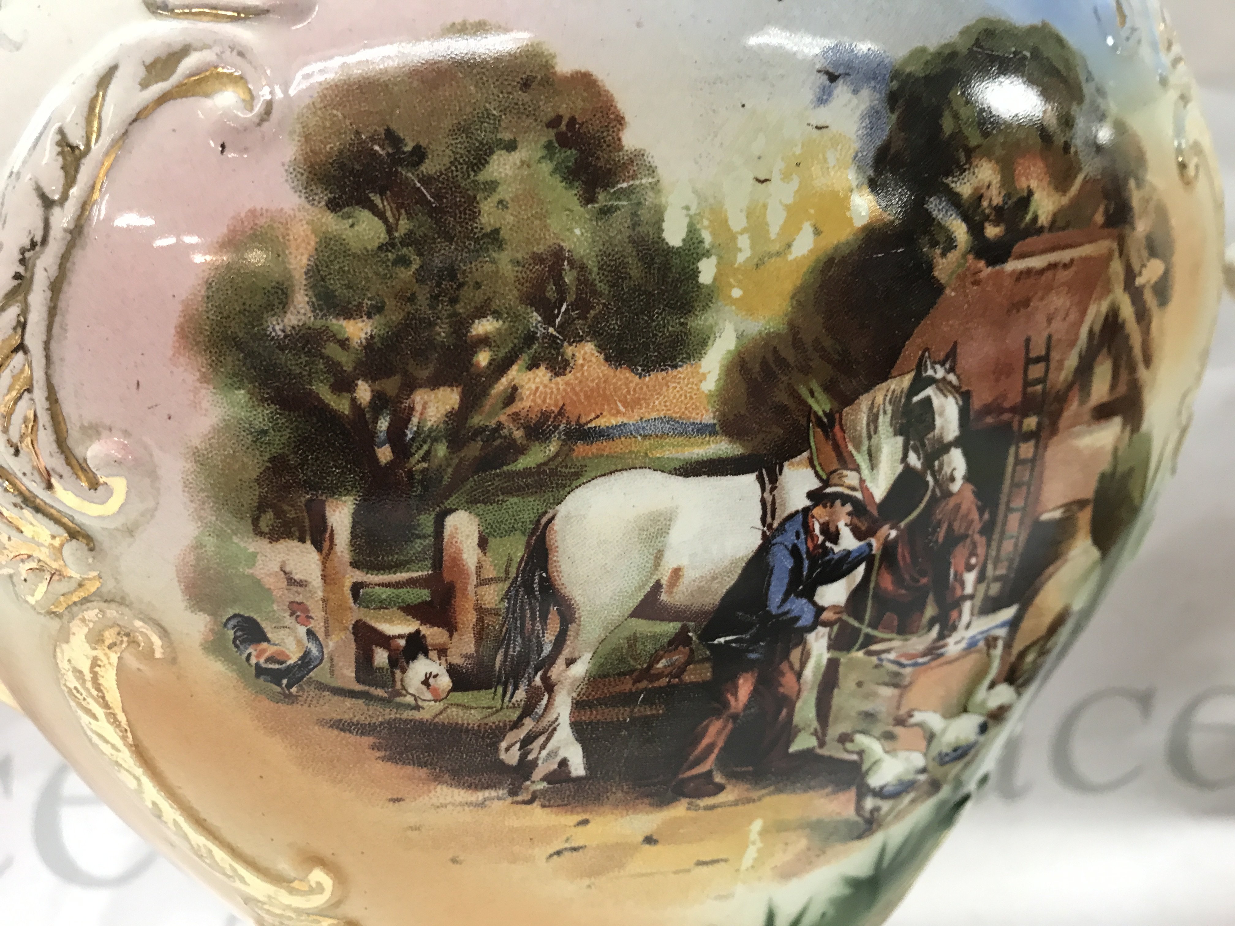 A pair of New Victor porcelain vases with countryside farm scene decorations 36cm tall . This lot cannot be posted. NO RESERVE