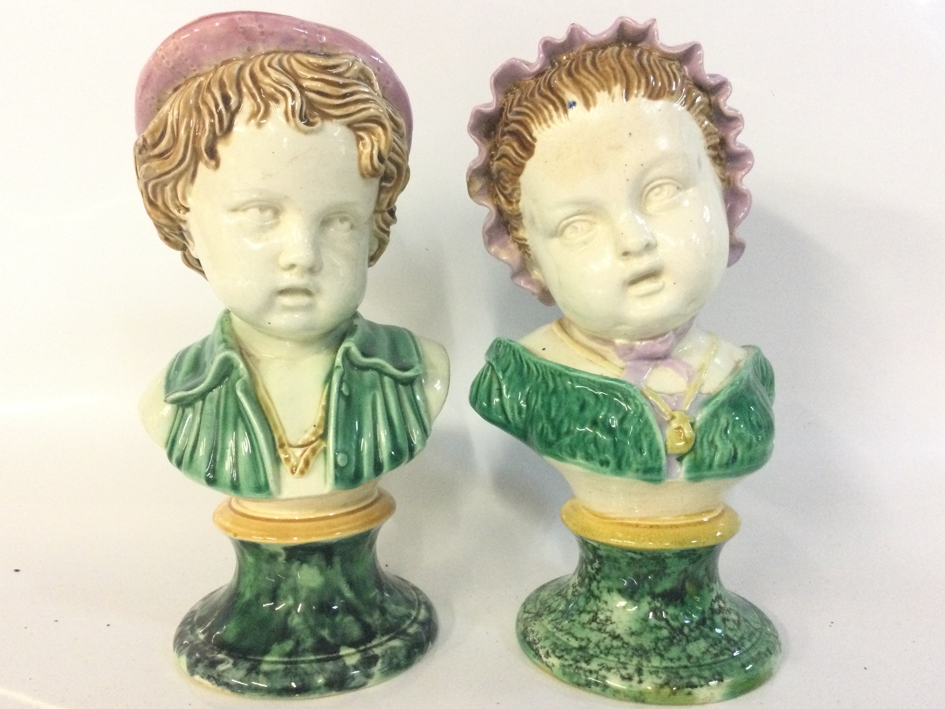 Majorica pottery busts, 21cm tall. This lot cannot be posted
