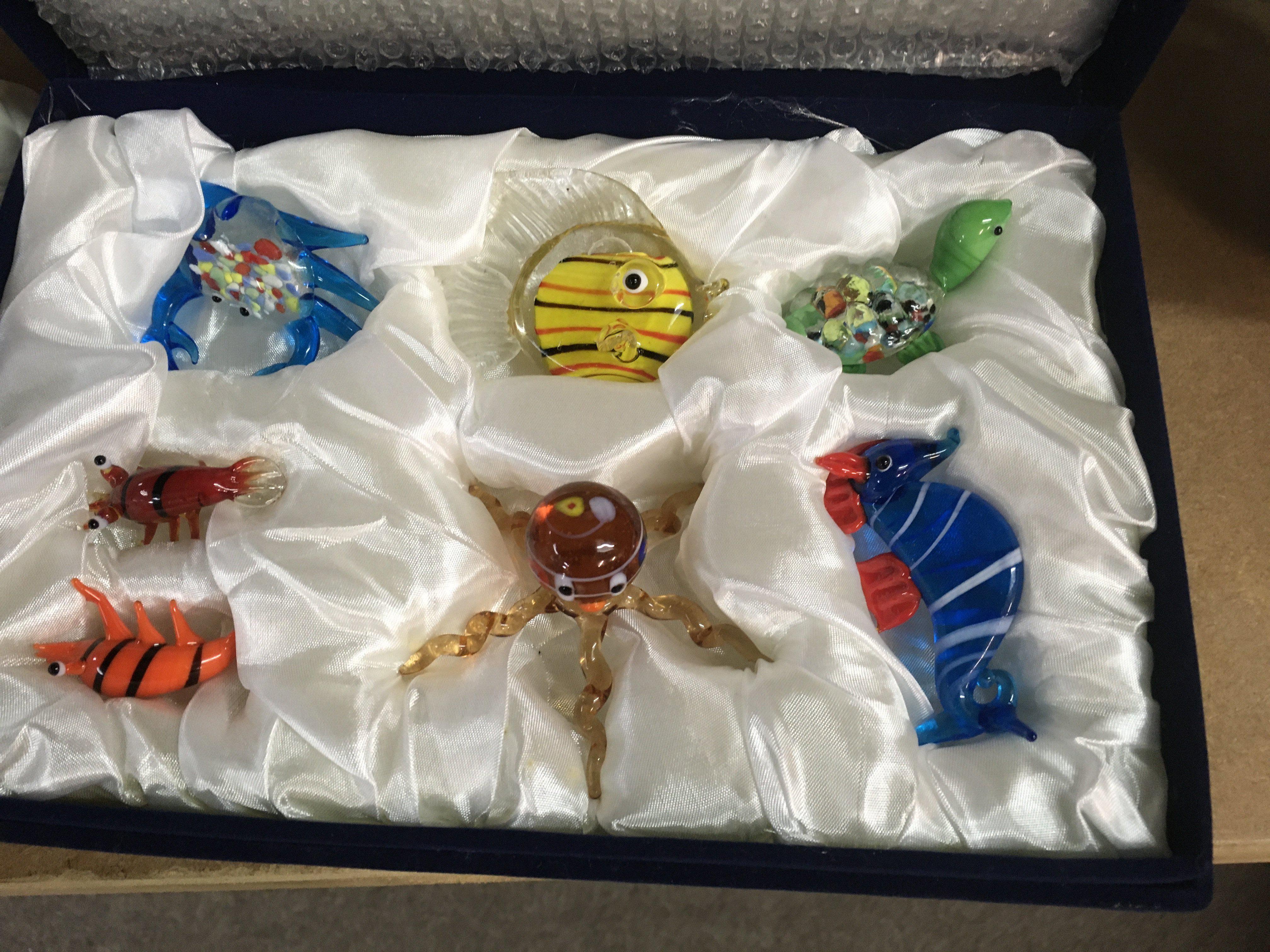 A Collection of seven glass murano animal figures In original box .