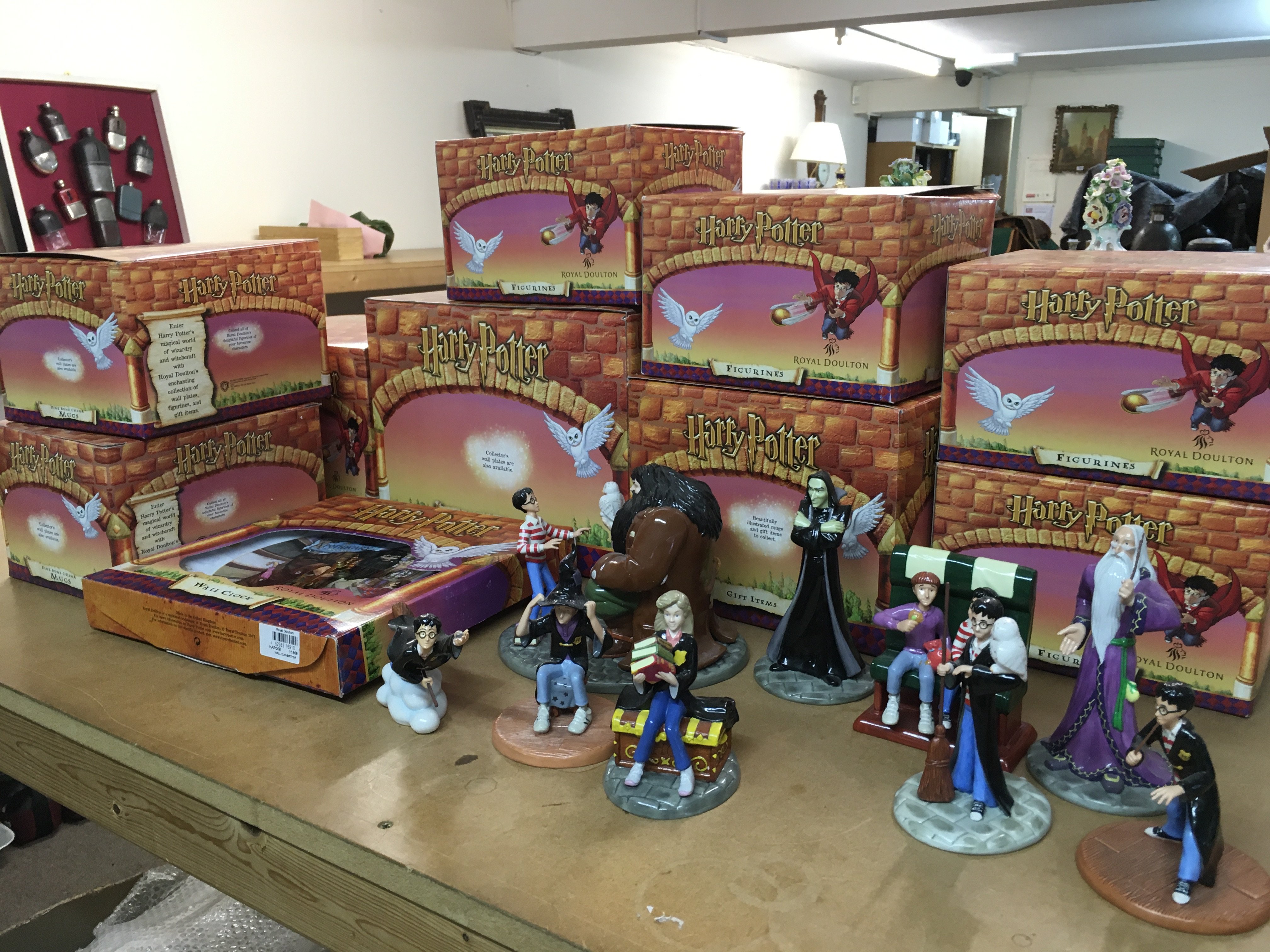 A collection of boxed Royal Doulton Harry Potter ceramic figures . This lot cannot be posted