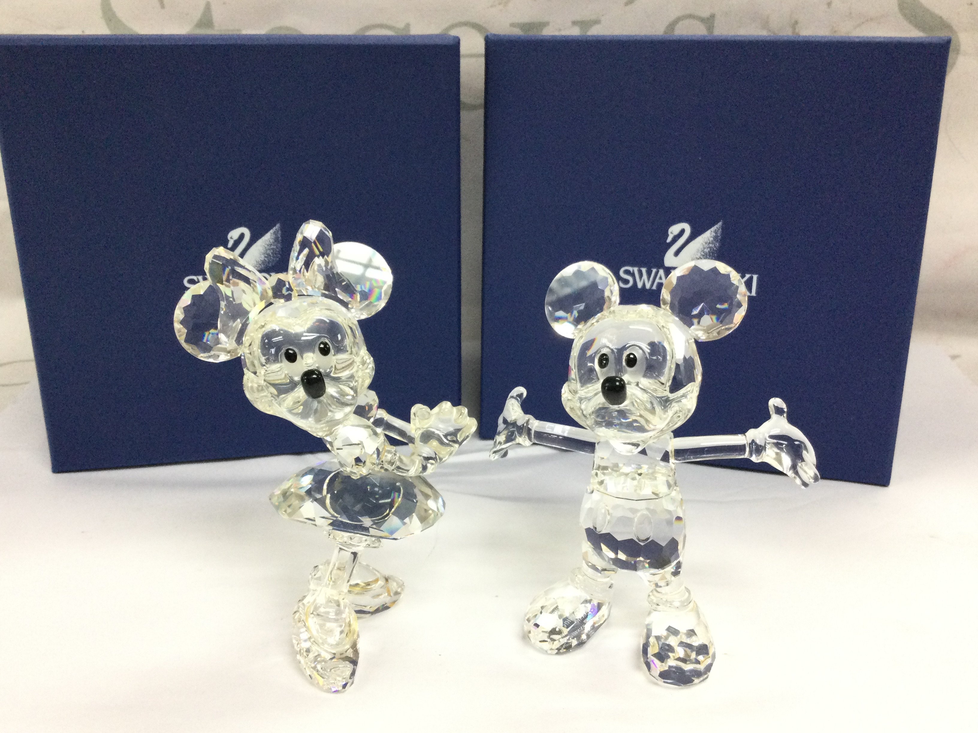 Boxed Swarovski Crystal Glass Disney Mickey And Minnie figures . No obvious damage or restoration This lot cannot be posted