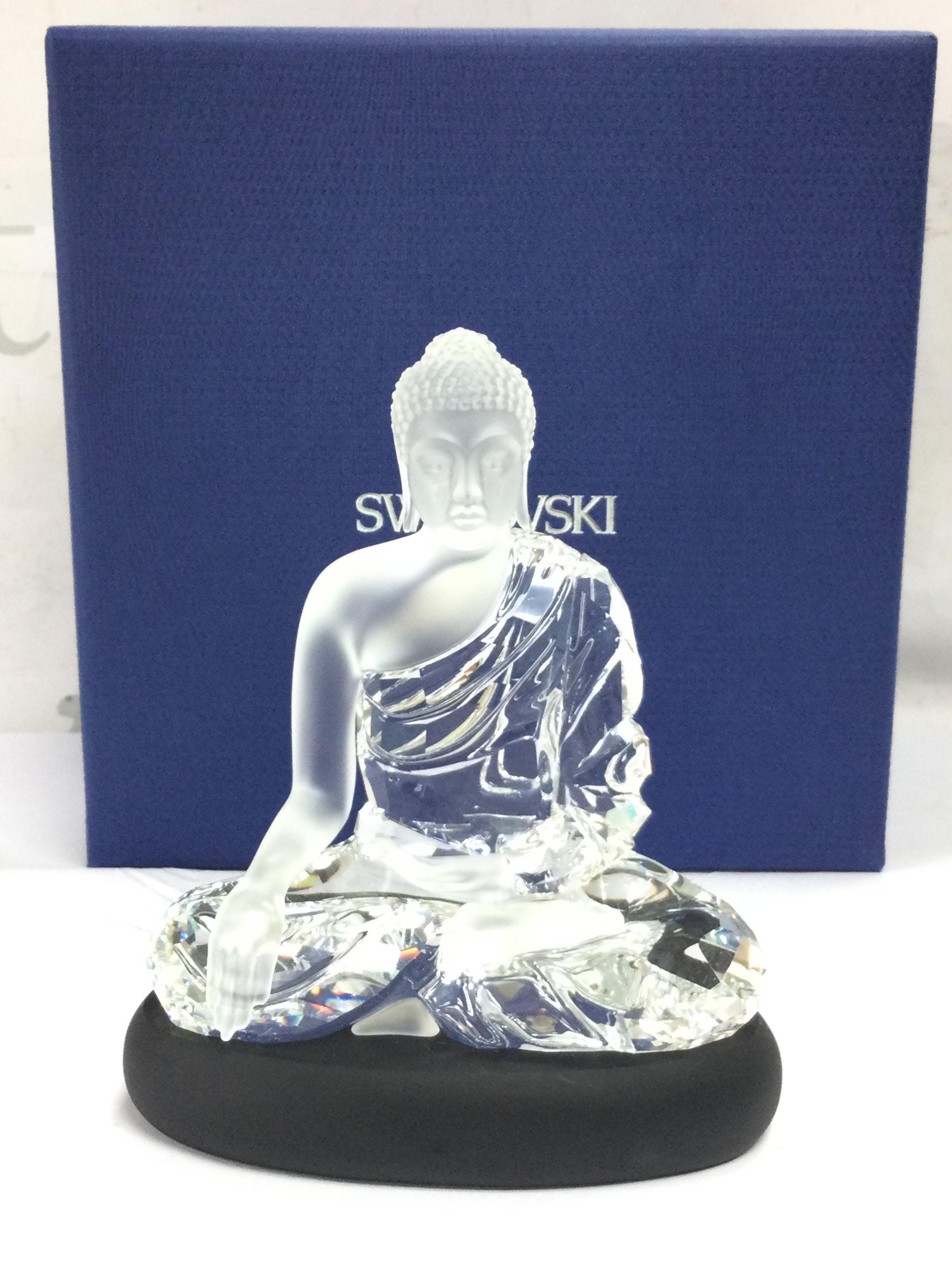 A boxed Swarovski crystal glass Buddha figure . No obvious damage or restoration. This lot cannot be posted