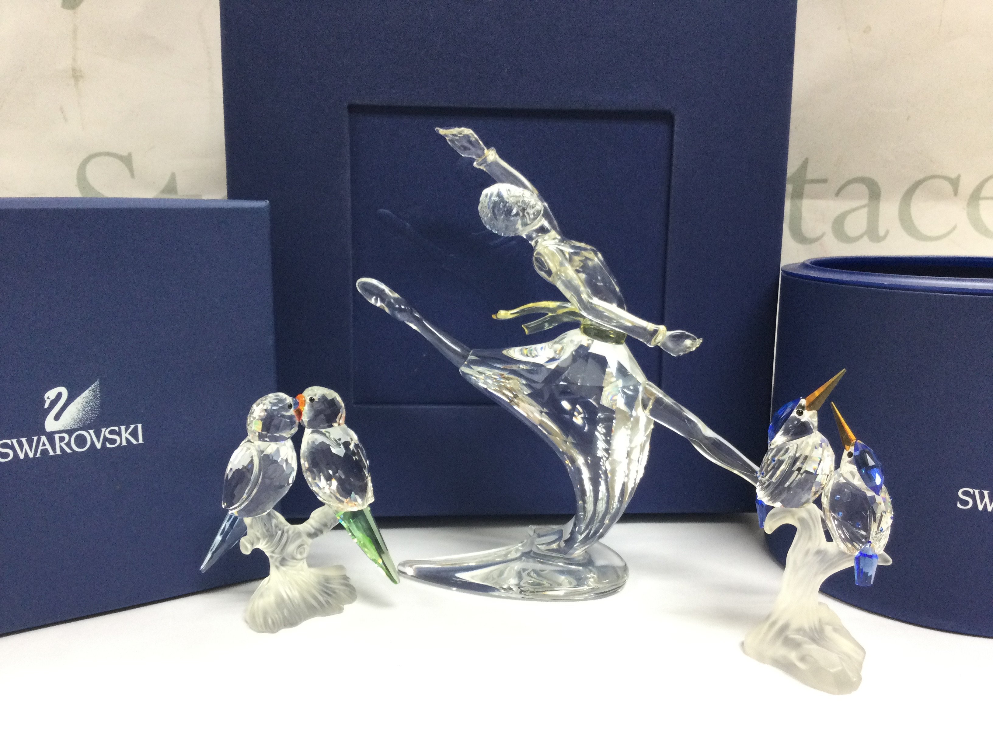 Boxed Swarovski crystal glass figures including Anna ballerina , Budgies , Kingfishers . This lot cannot be posted